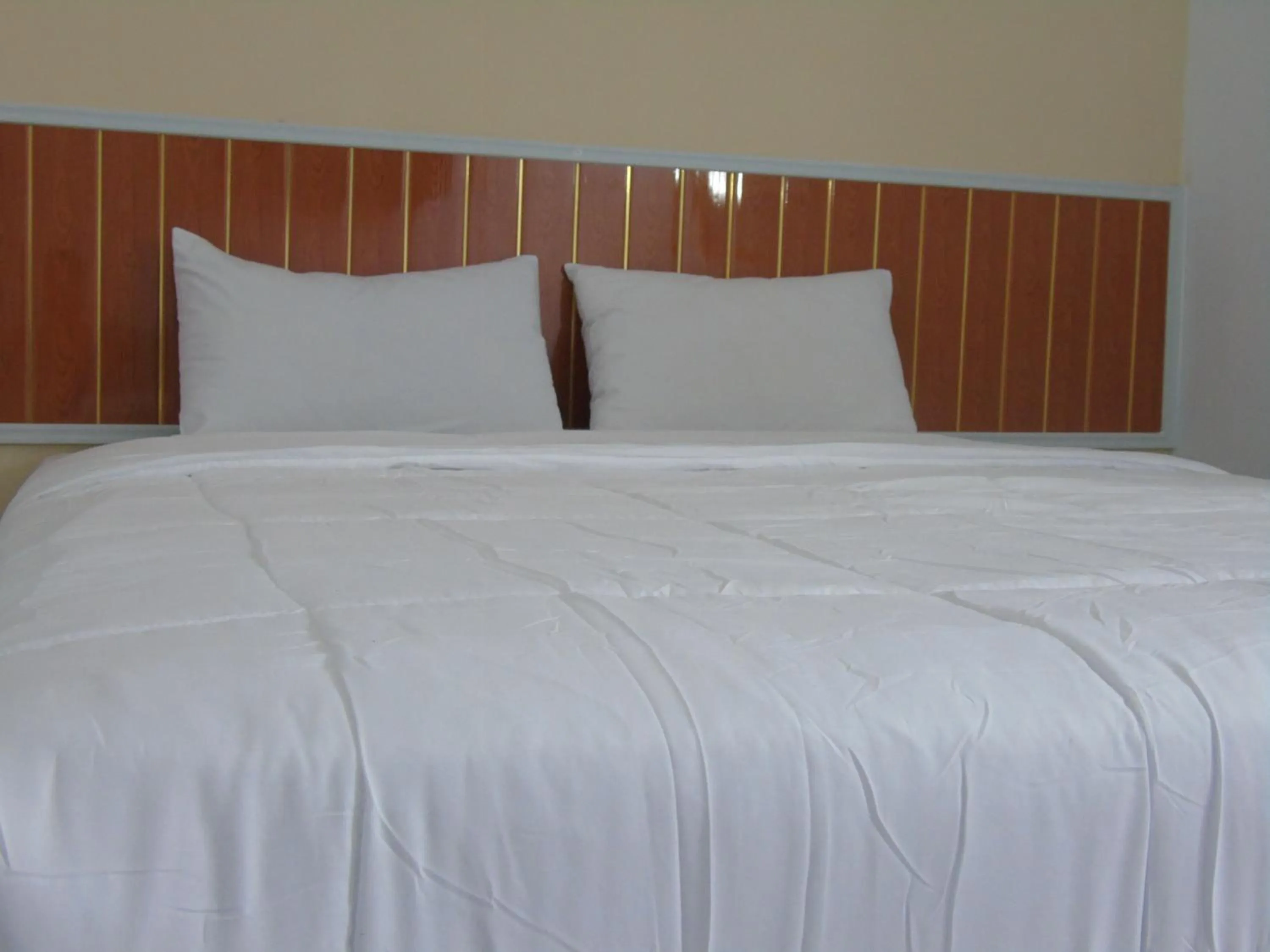 Bed in Hotel Permata Zamrud