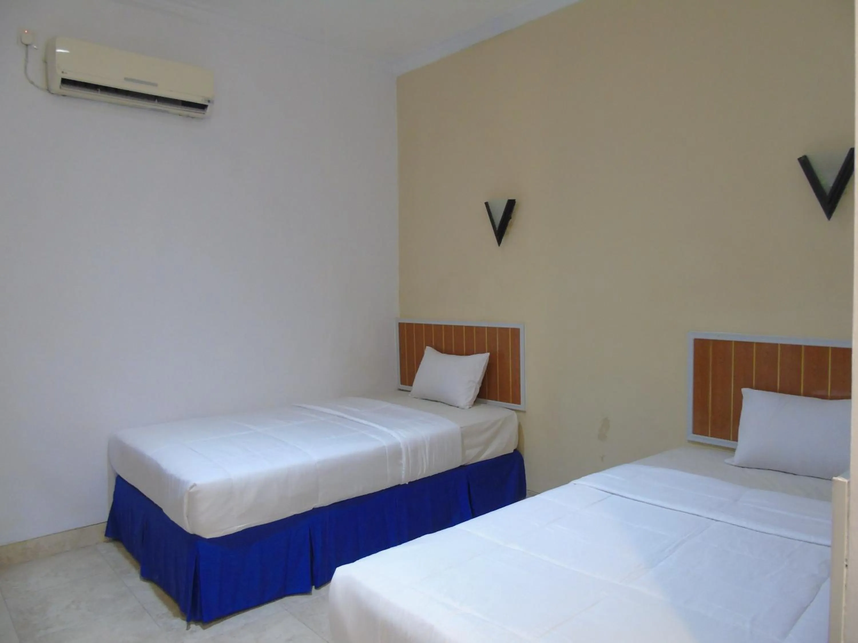 Bed in Hotel Permata Zamrud