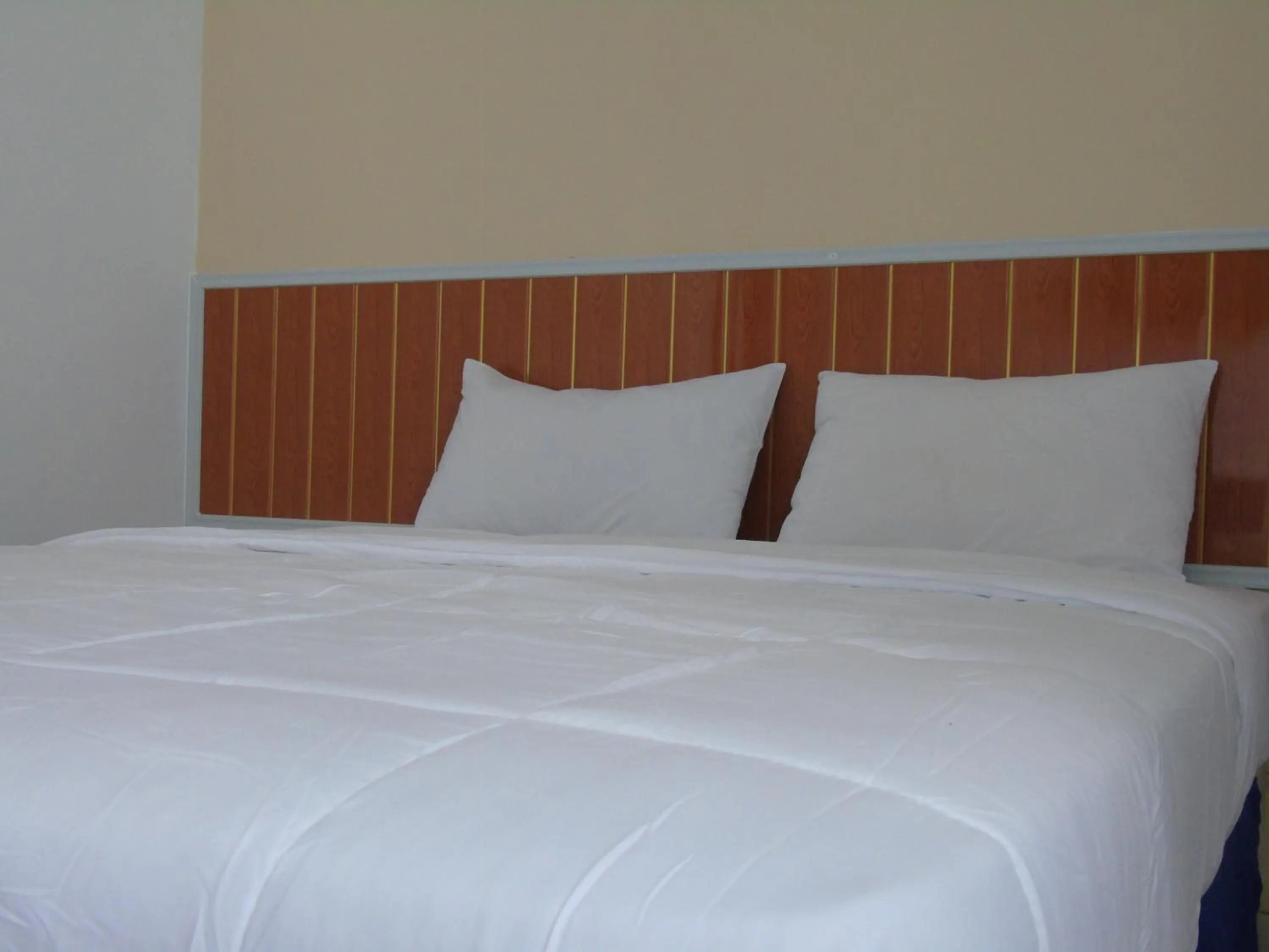 Bed in Hotel Permata Zamrud