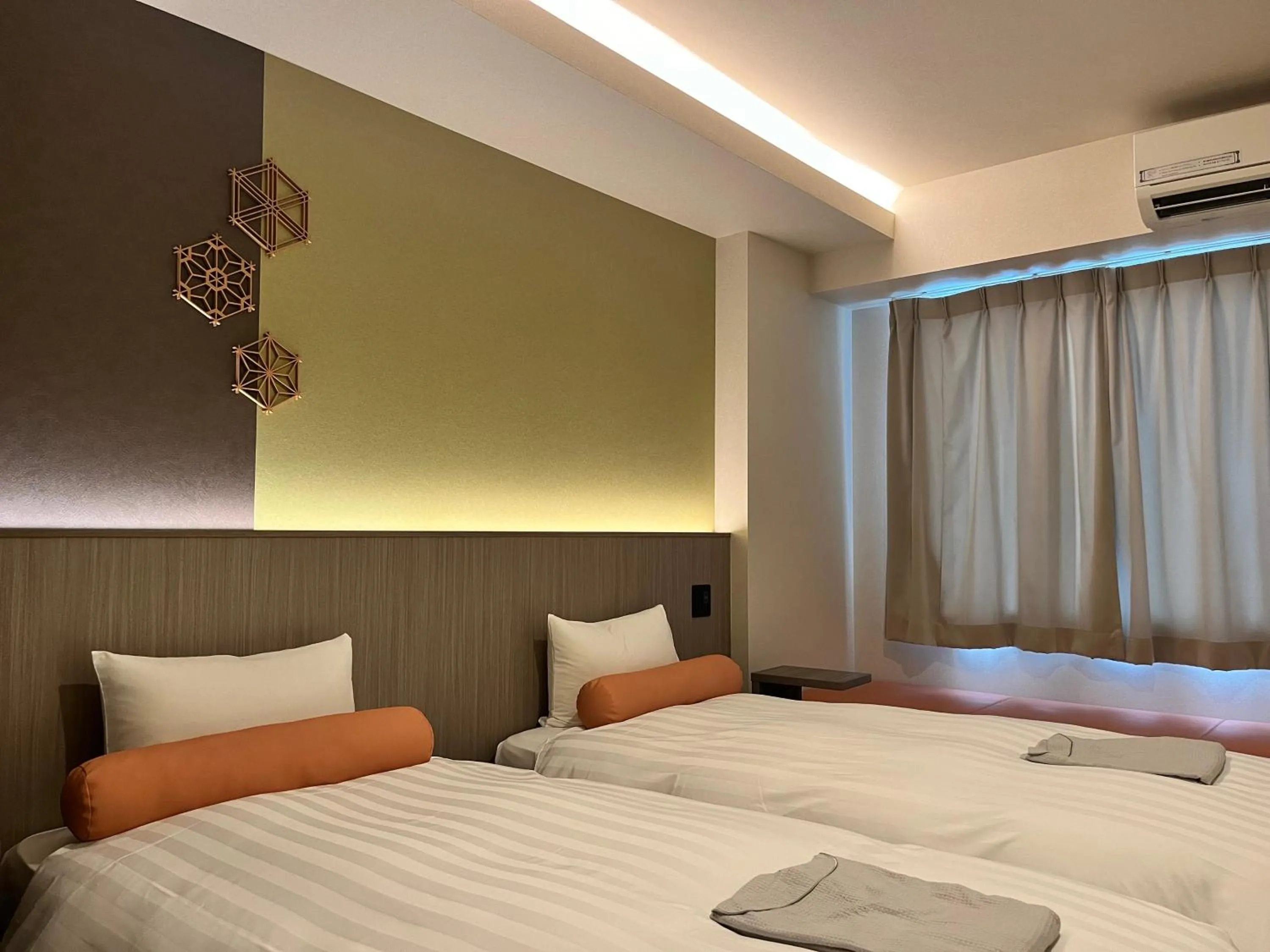 Bed in Hotel Japanesque Kyoto Station ZEQUU