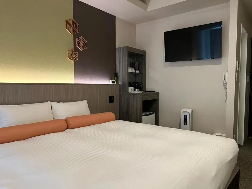 Bed in Hotel Japanesque Kyoto Station ZEQUU