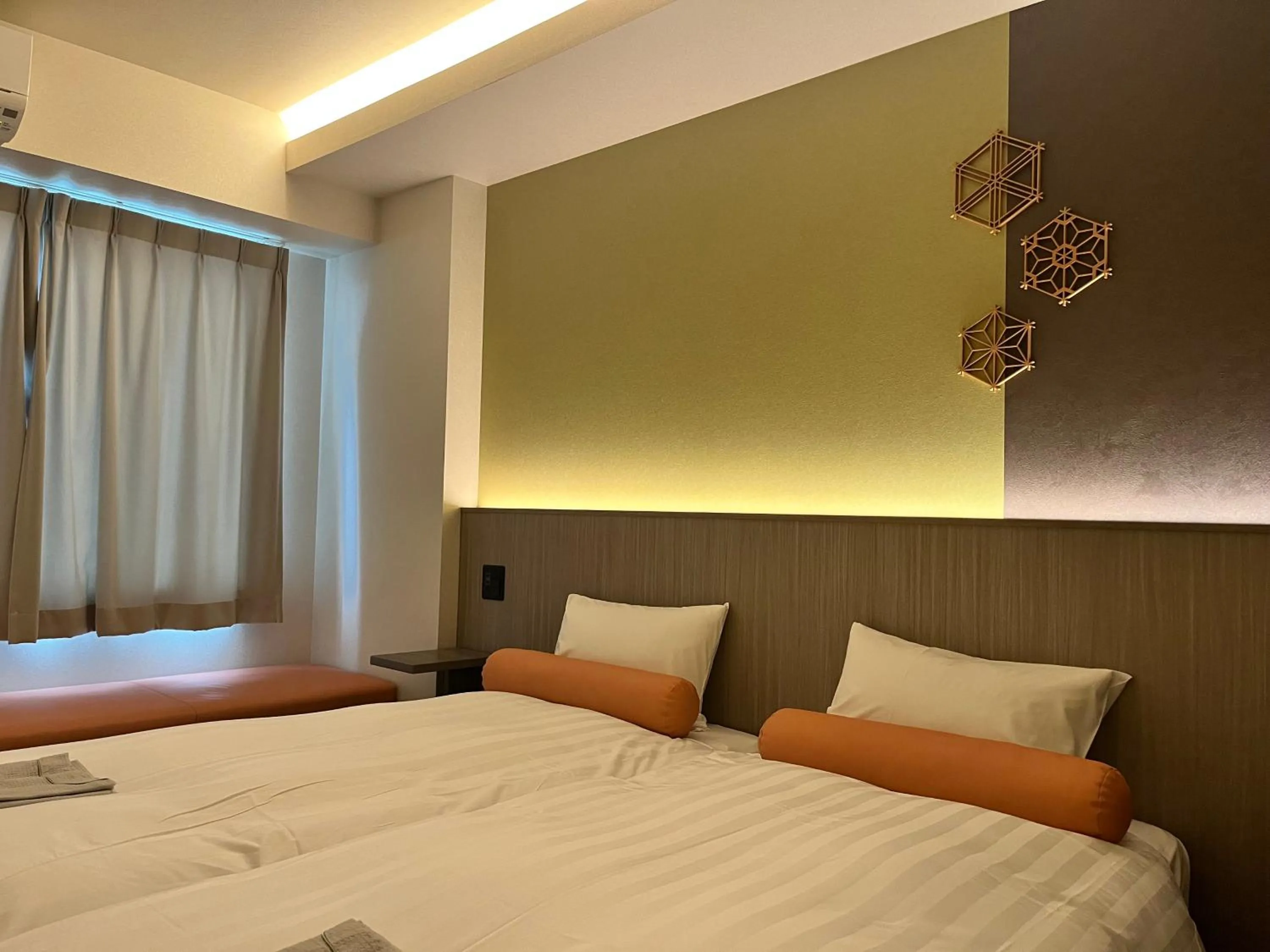 Bed in Hotel Japanesque Kyoto Station ZEQUU