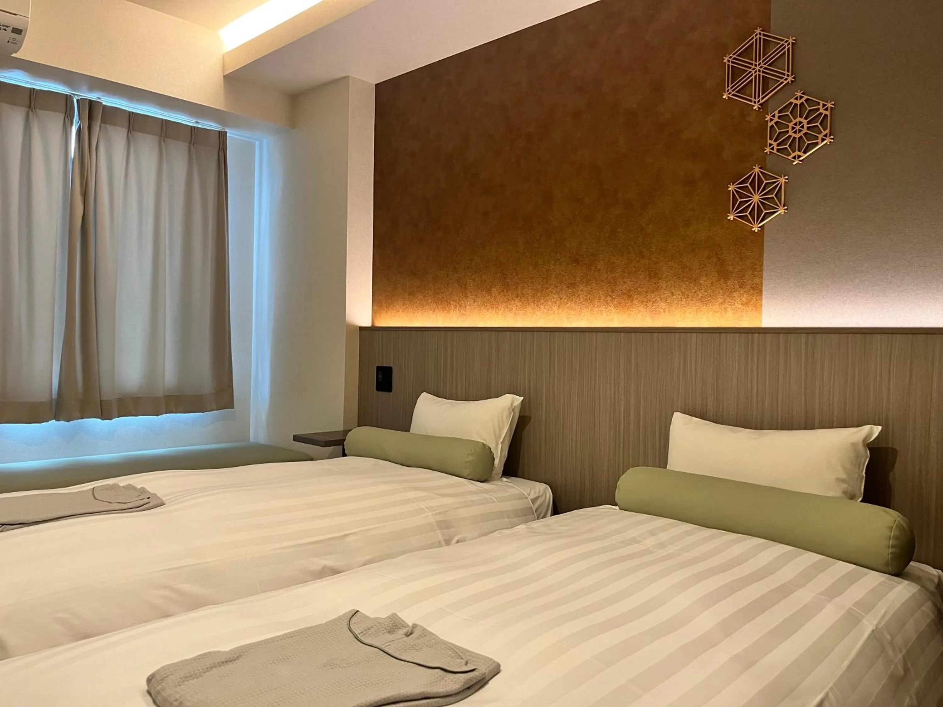 Bed in Hotel Japanesque Kyoto Station ZEQUU