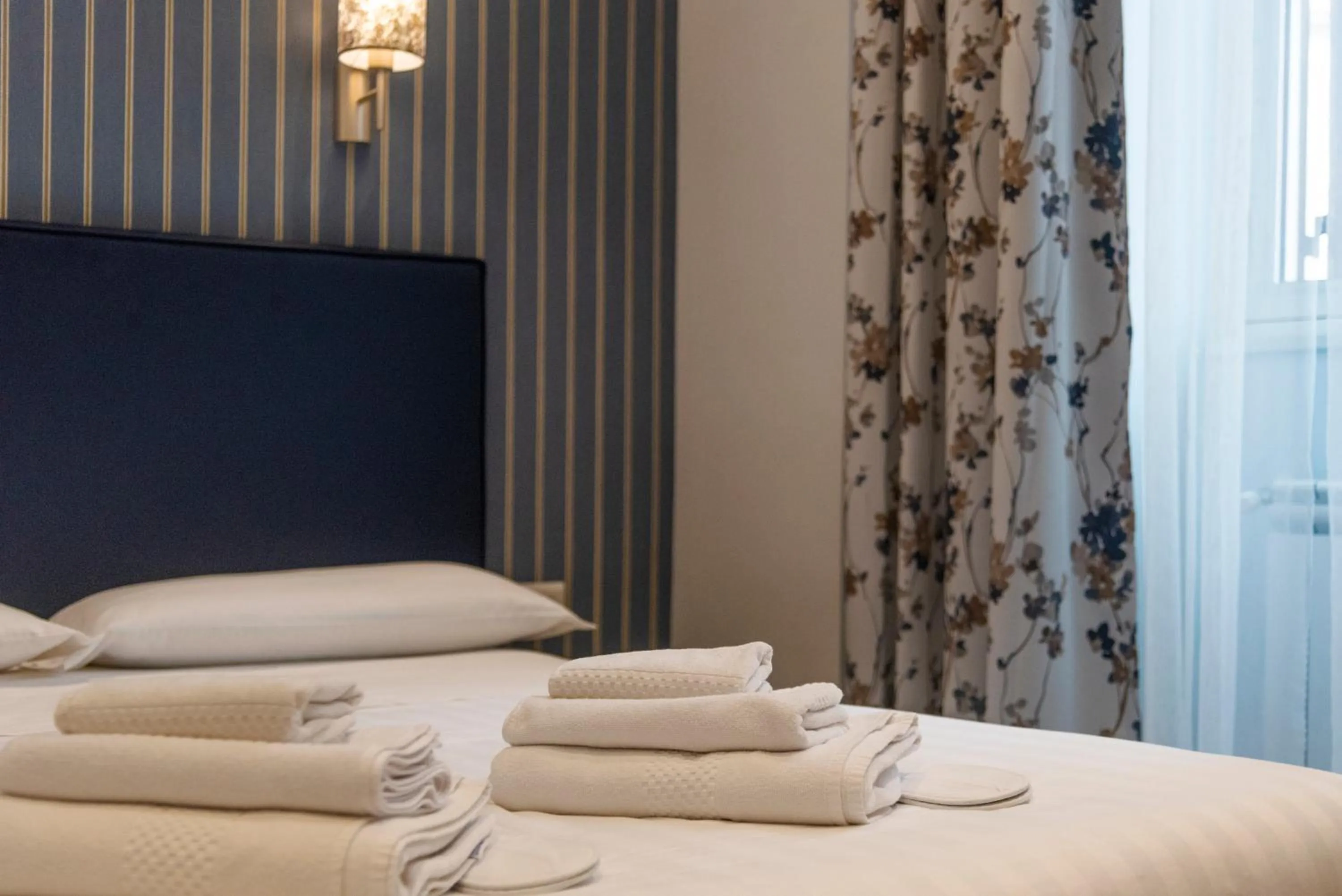 Bed in La Grande Bellezza Guest House Rome