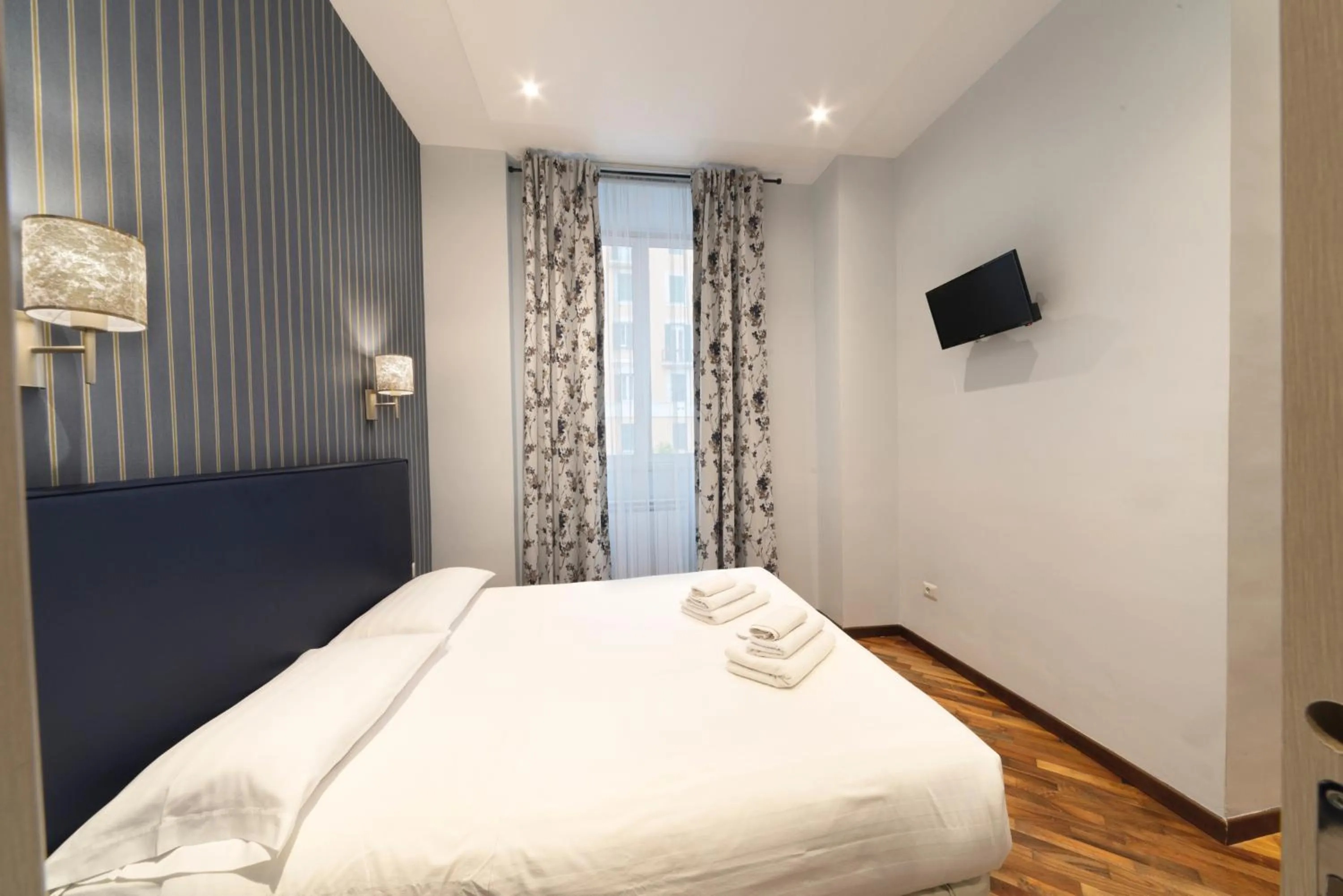 Bed in La Grande Bellezza Guest House Rome