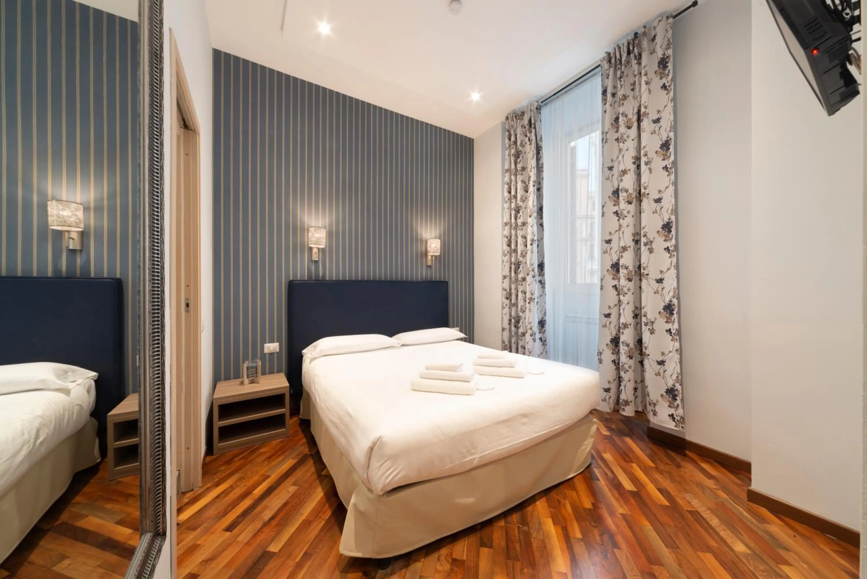 Bed in La Grande Bellezza Guest House Rome