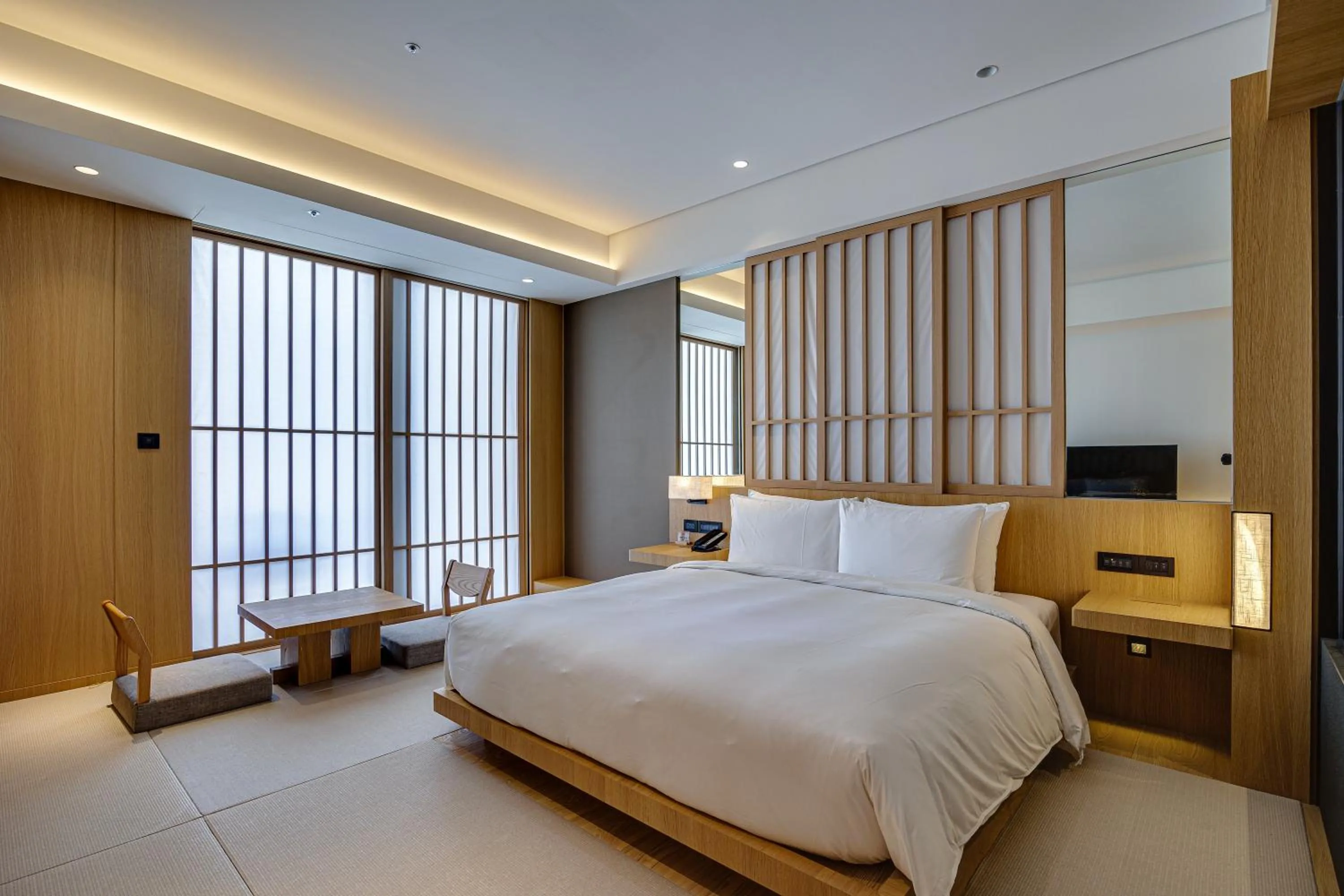 Bed in Boutech Wuri Village Hotel