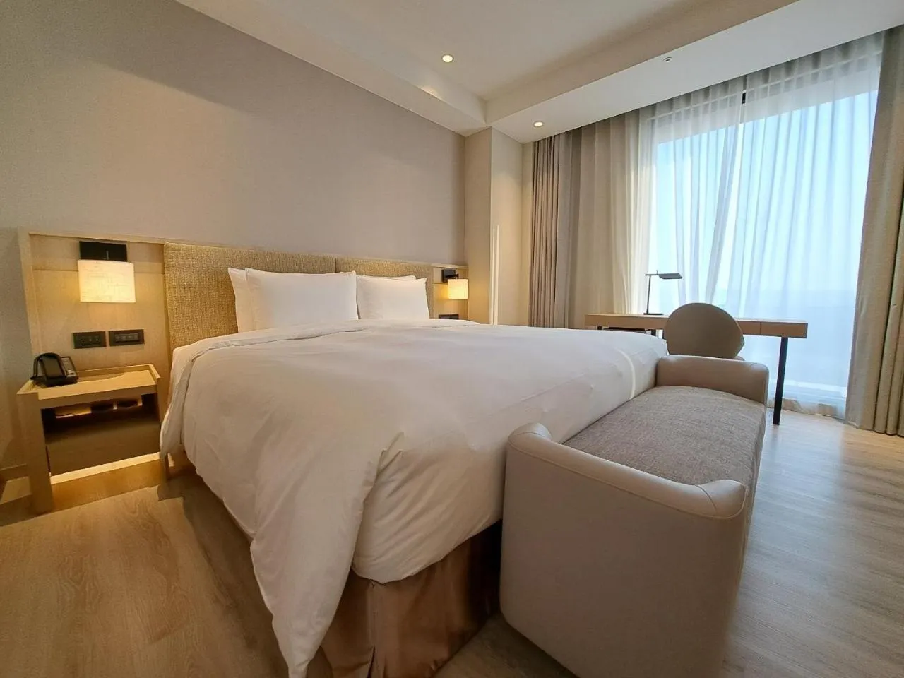 Bed in Boutech Wuri Village Hotel