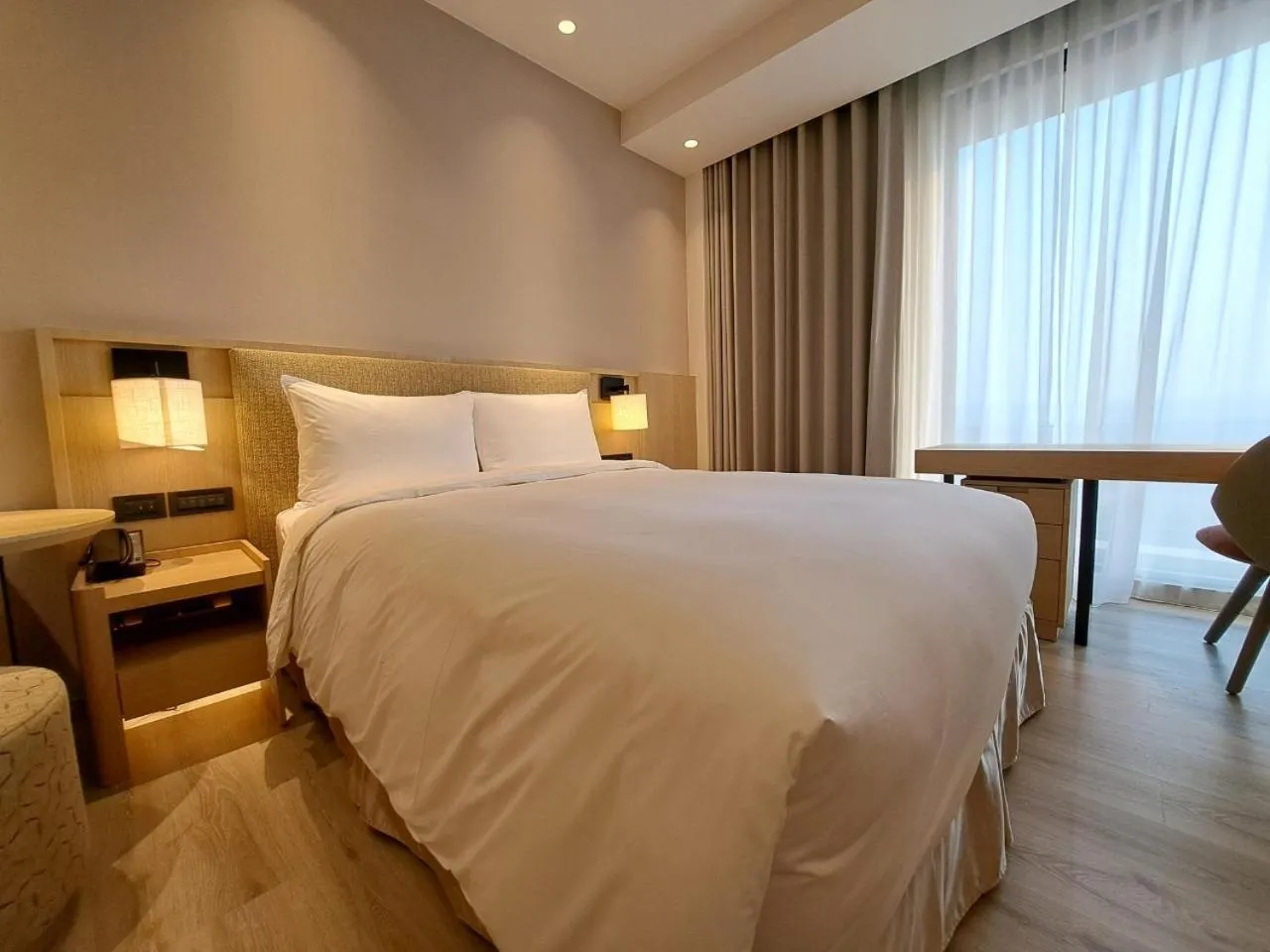 Bed in Boutech Wuri Village Hotel