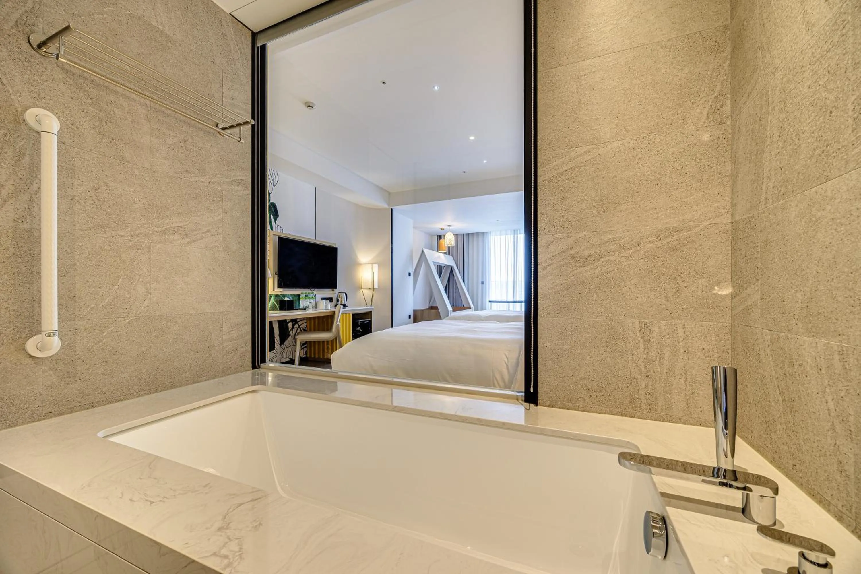 Bed in Boutech Wuri Village Hotel