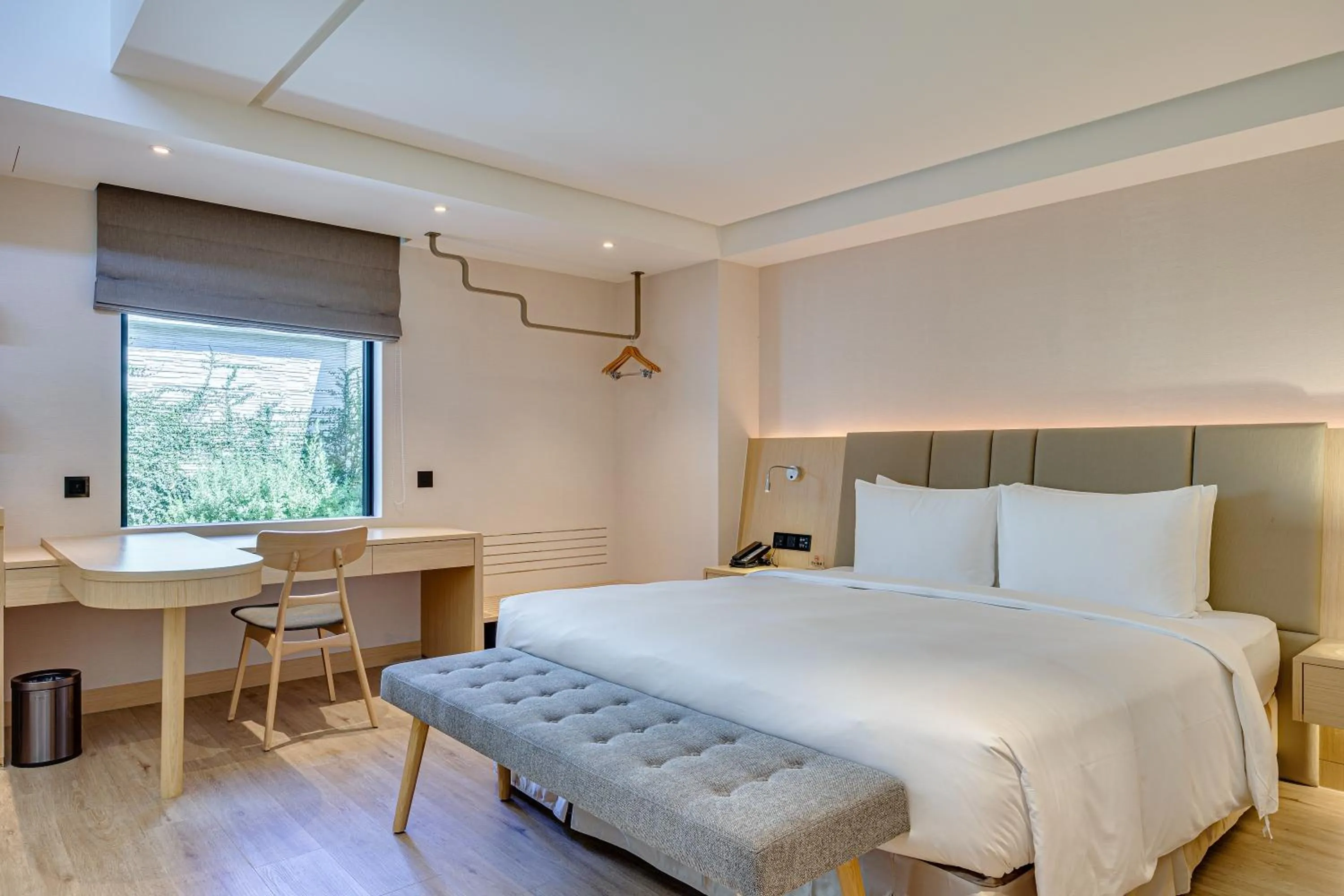 Bed in Boutech Wuri Village Hotel