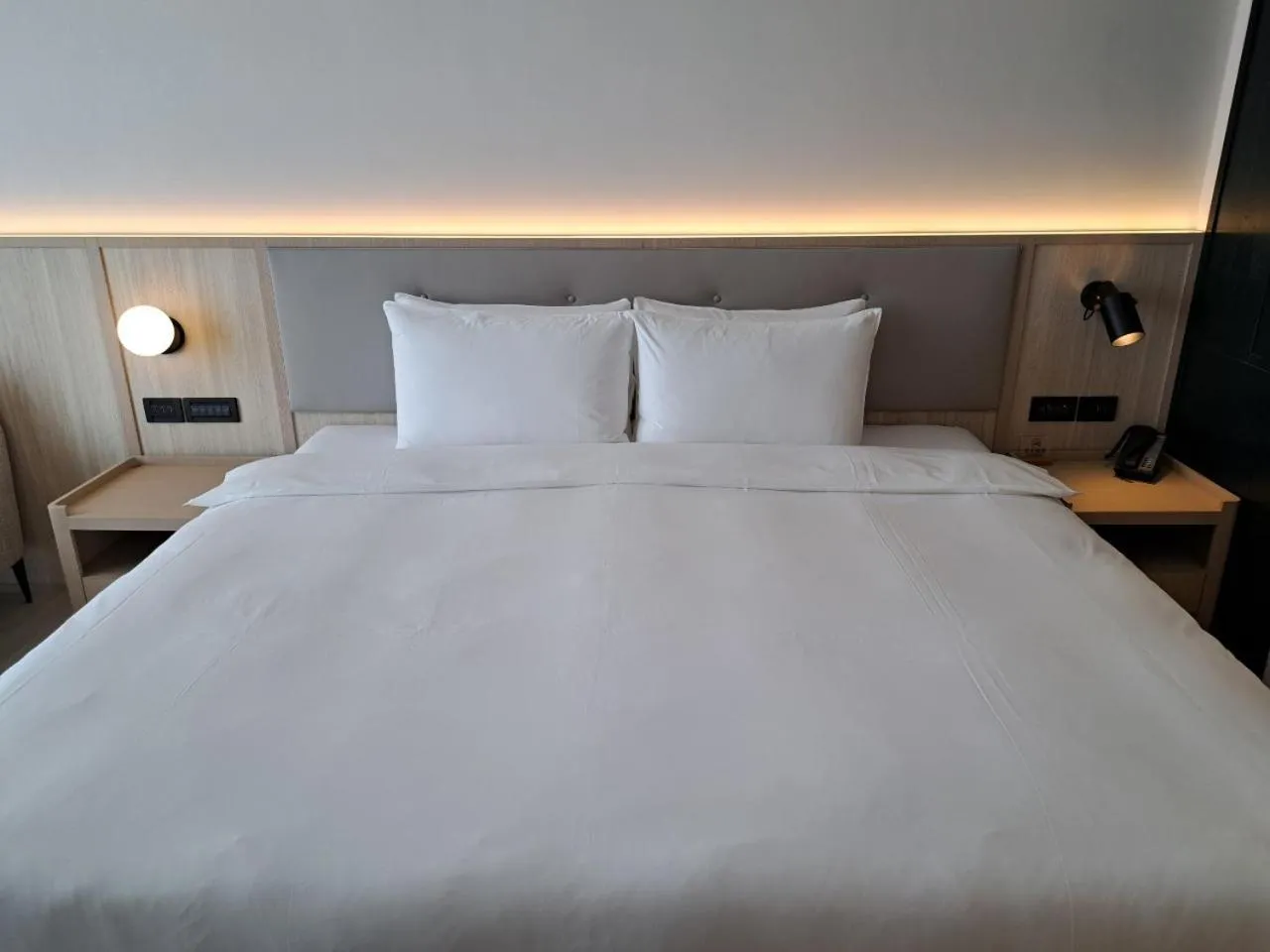 Bed in Boutech Wuri Village Hotel