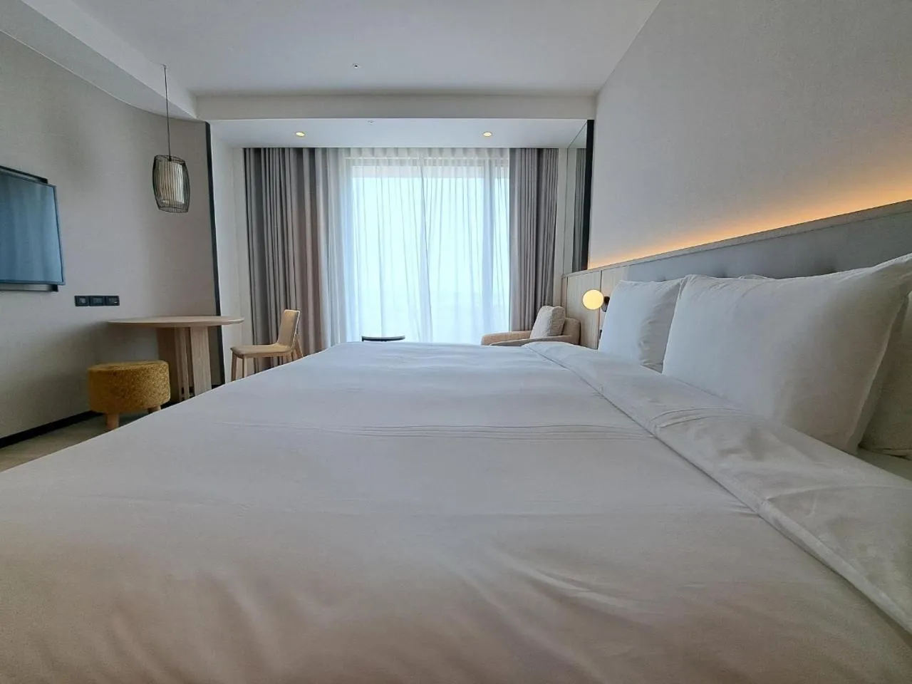 Bed in Boutech Wuri Village Hotel