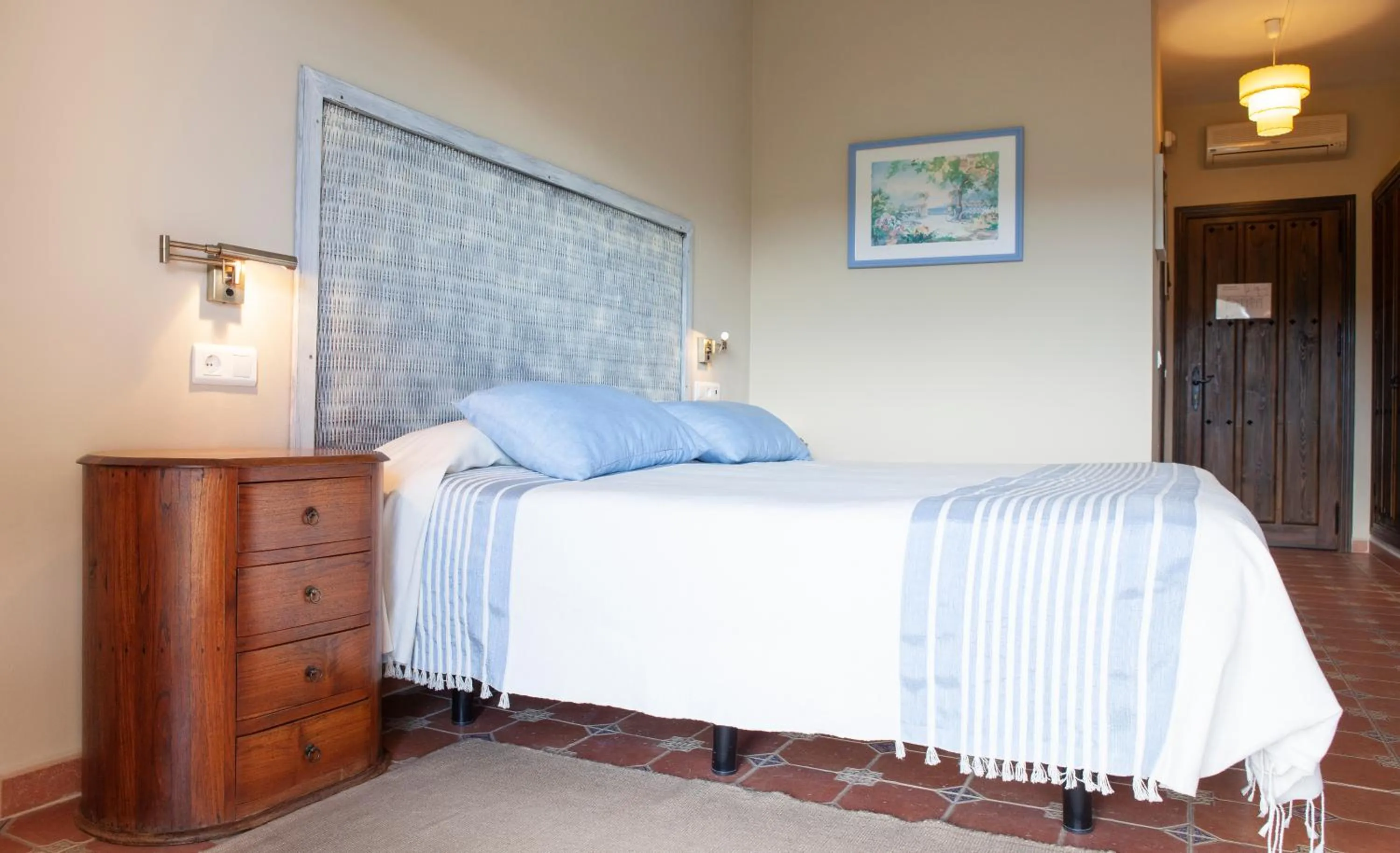 Bedroom in Hotel Cortijo de Salia