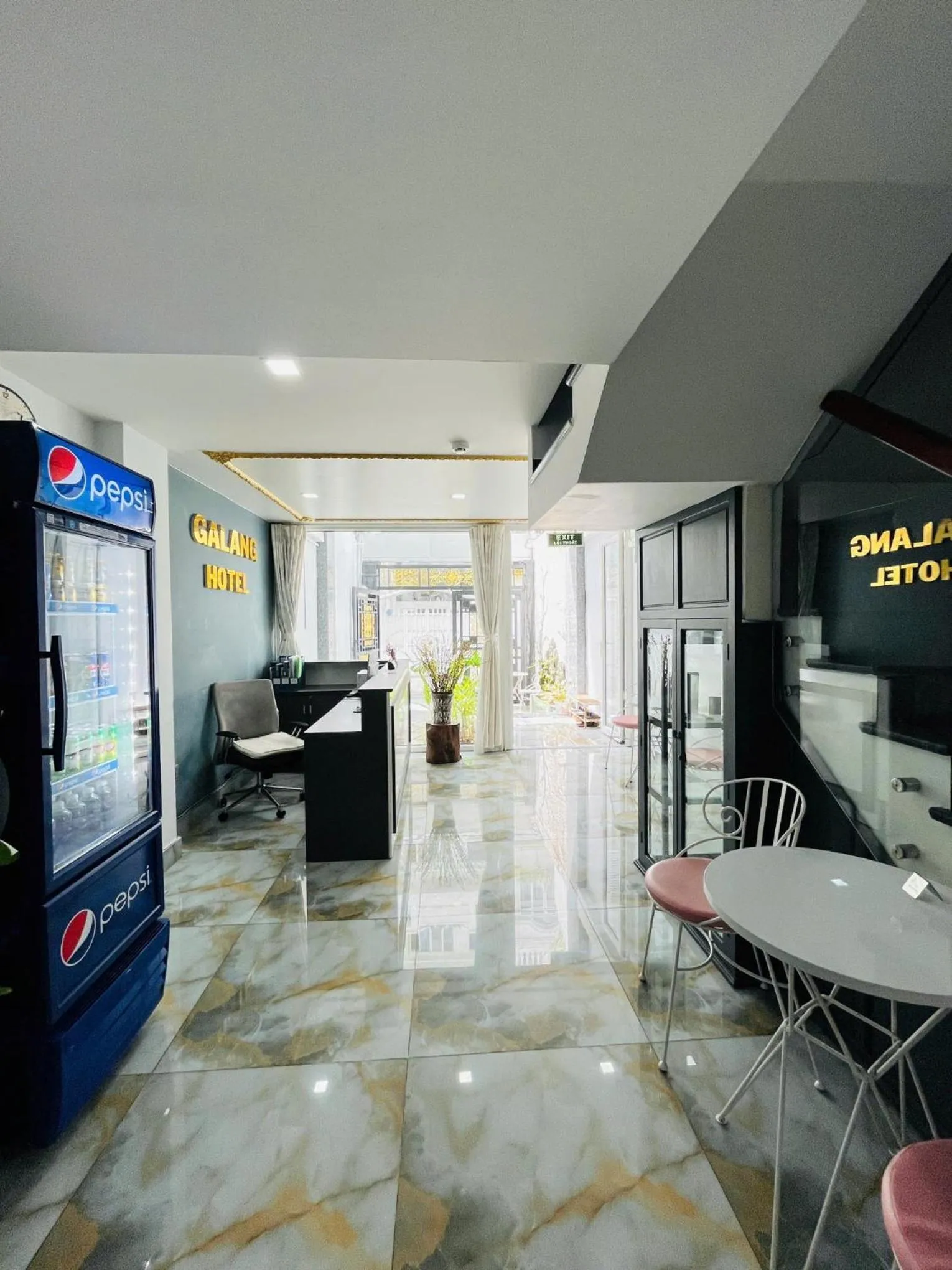 Communal lounge/ TV room in GALANG HOTEL