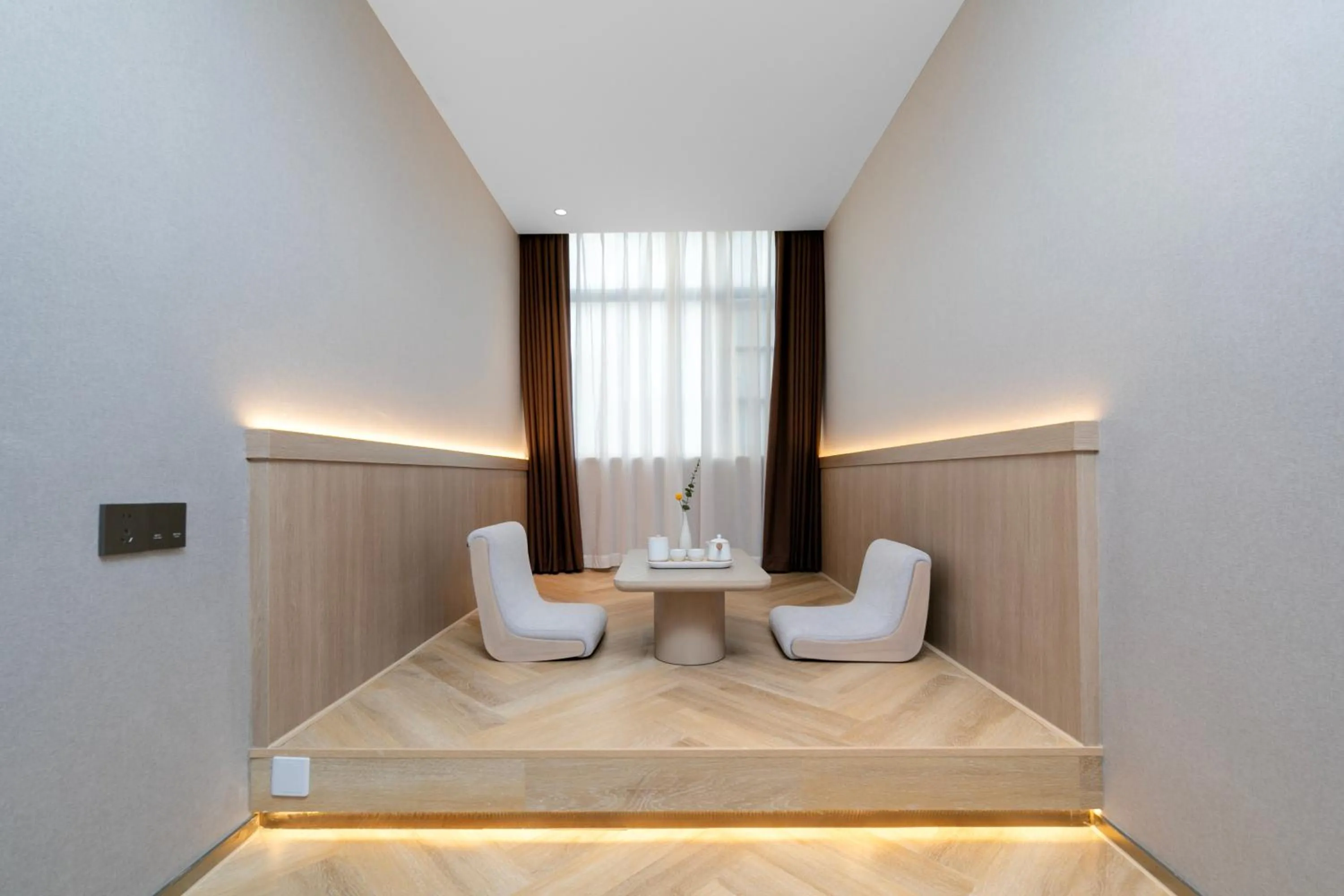 Seating area in Ramada by Wyndham Wuhan Wangjiawan