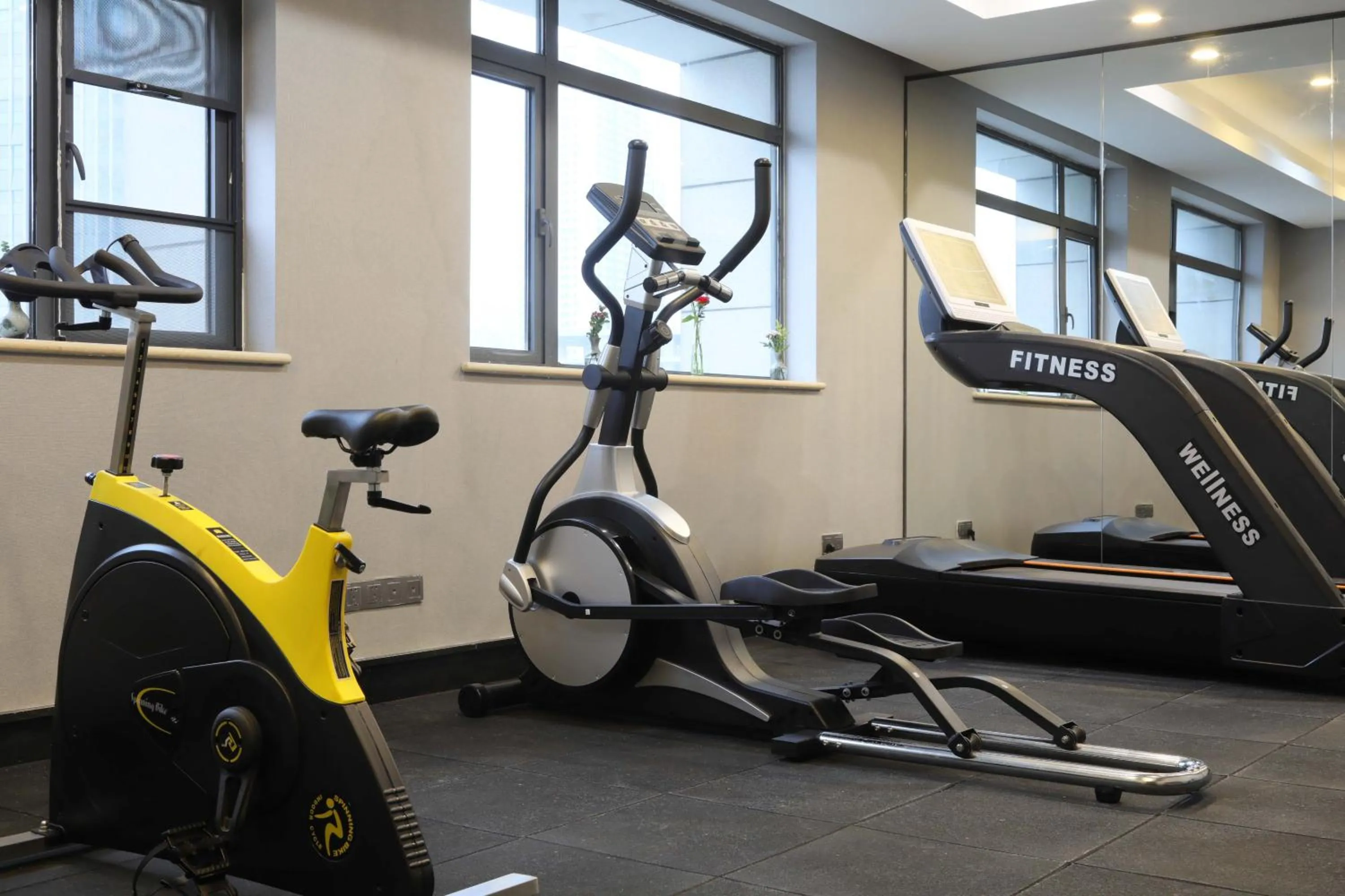 Fitness centre/facilities in Ramada by Wyndham Wuhan Wangjiawan