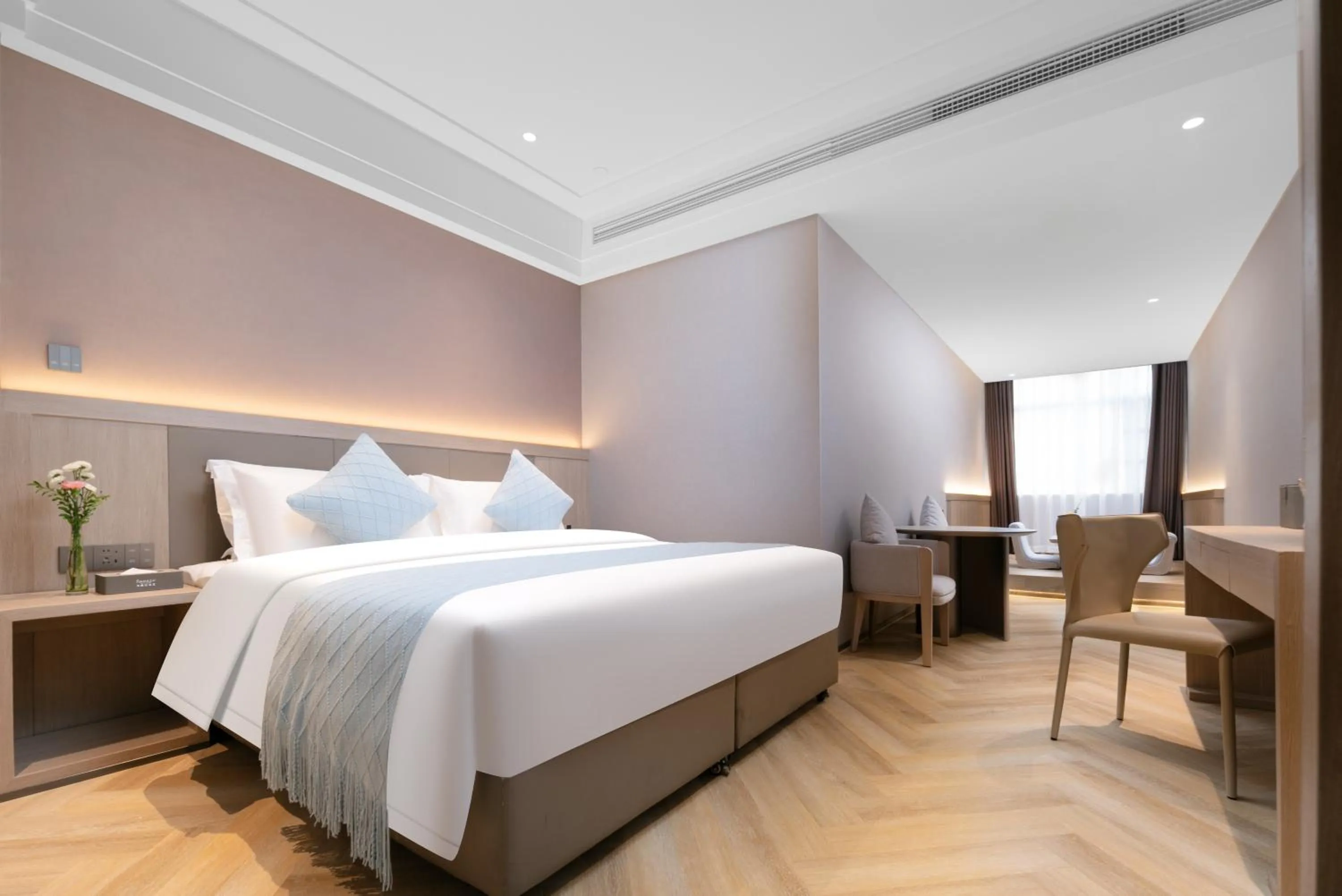 Bedroom in Ramada by Wyndham Wuhan Wangjiawan