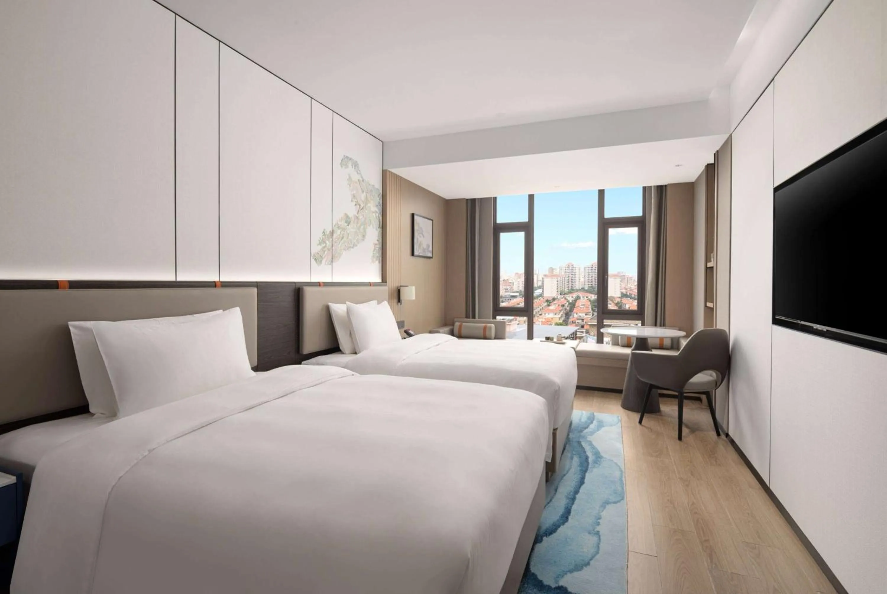 Photo of the whole room in Ramada Encore by Wyndham Dongguan Chang an