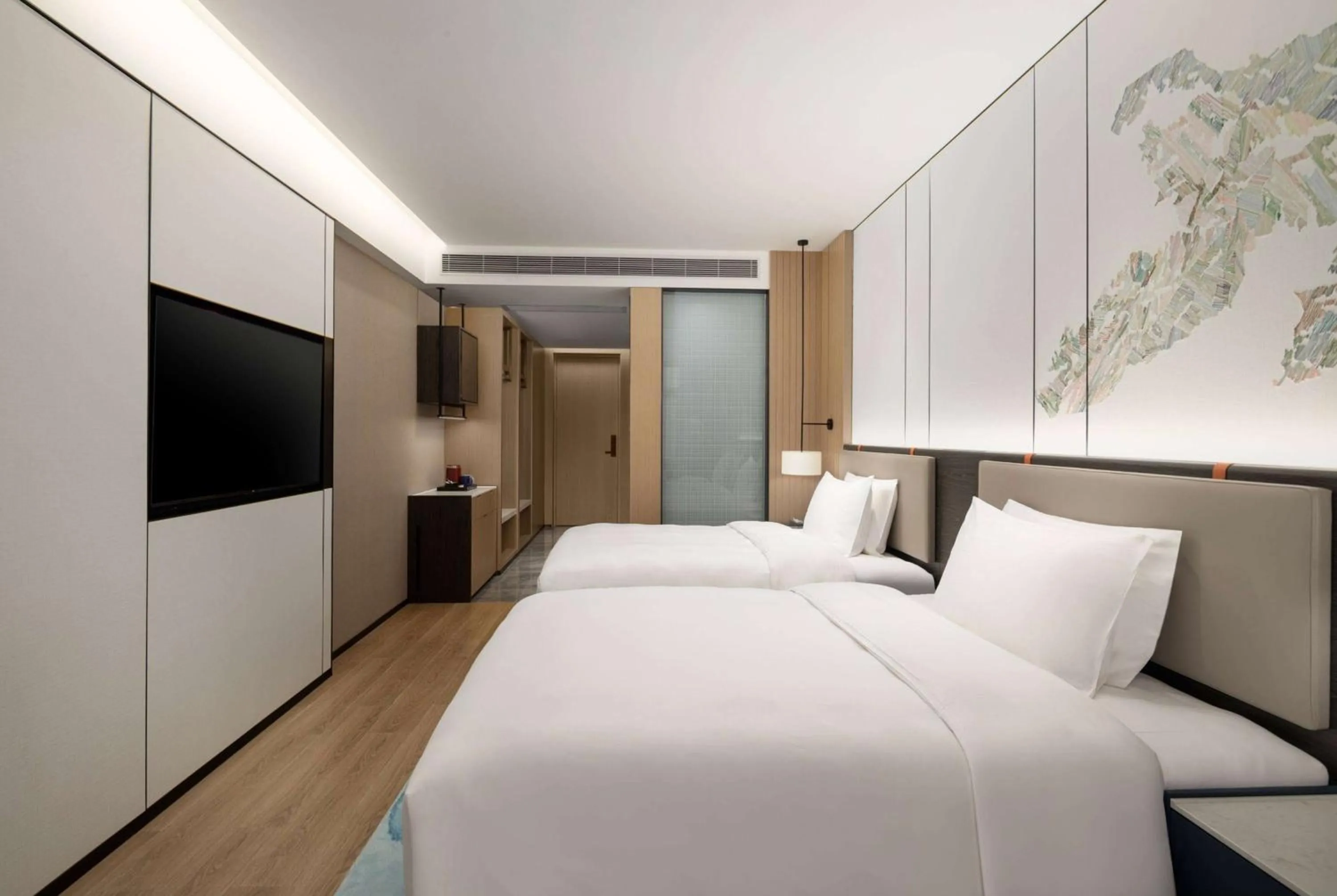 Photo of the whole room in Ramada Encore by Wyndham Dongguan Chang an