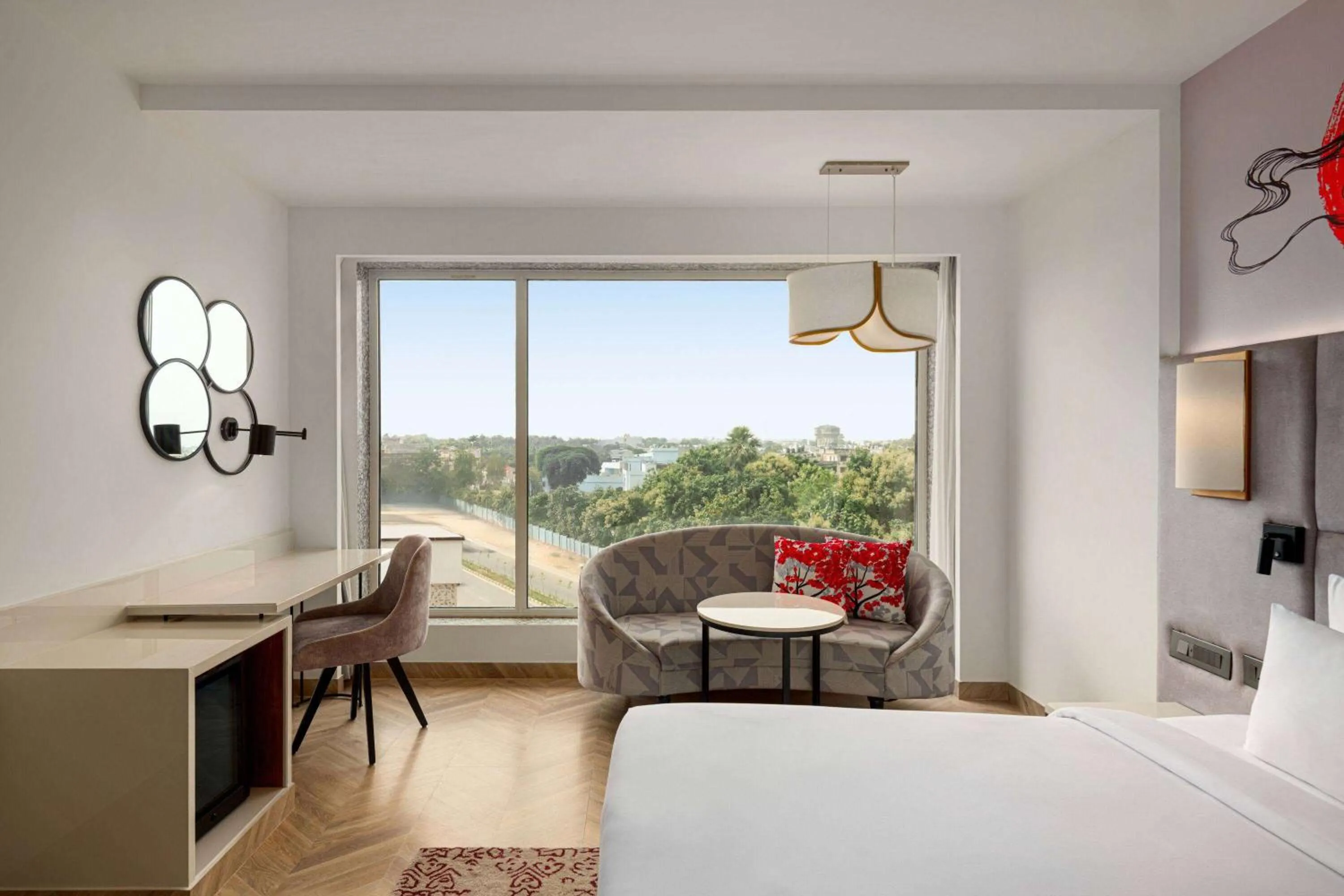 Photo of the whole room, Bed in Ramada by Wyndham Gorakhpur Gorakhnath Mandir Road