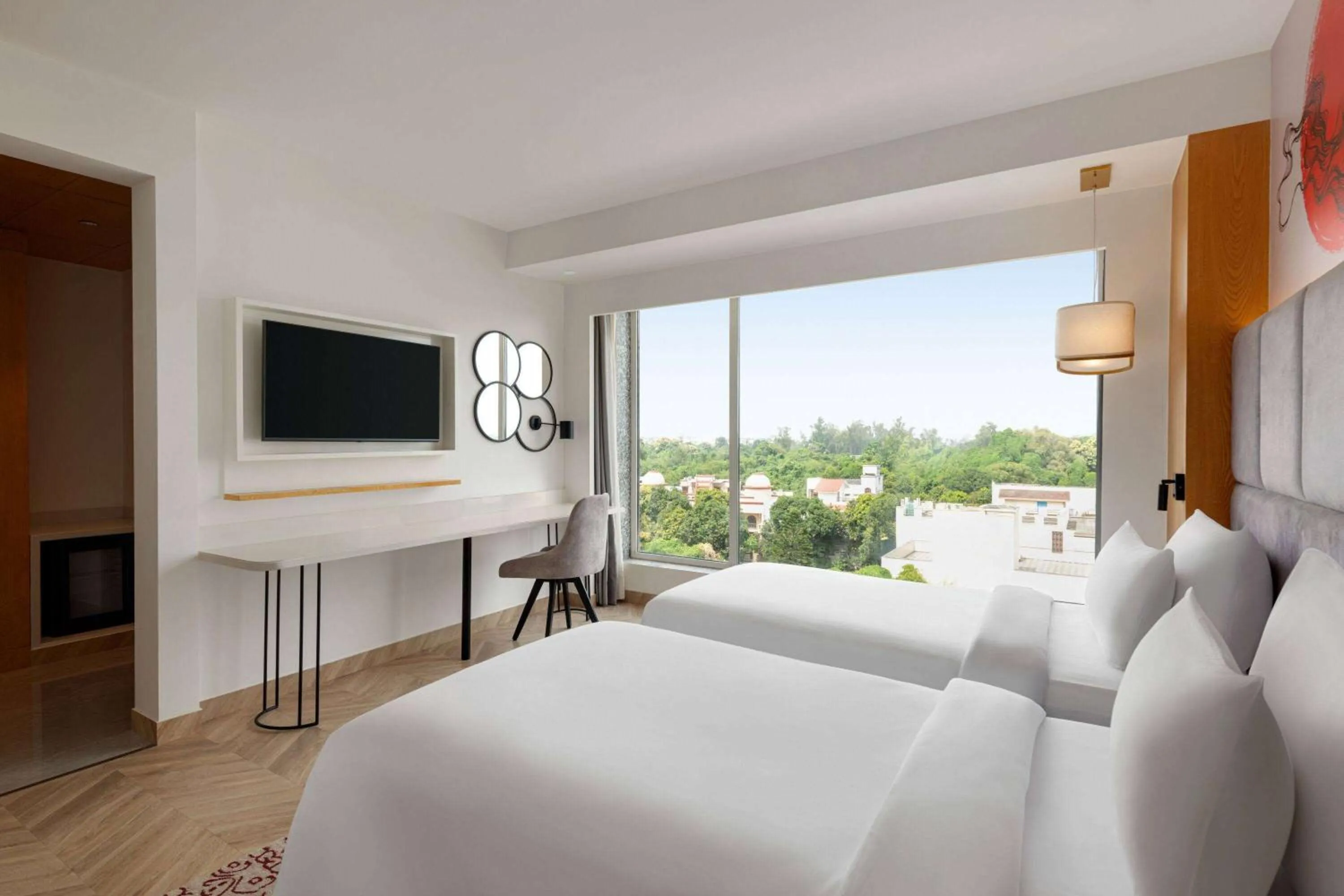 Photo of the whole room, Bed in Ramada by Wyndham Gorakhpur Gorakhnath Mandir Road