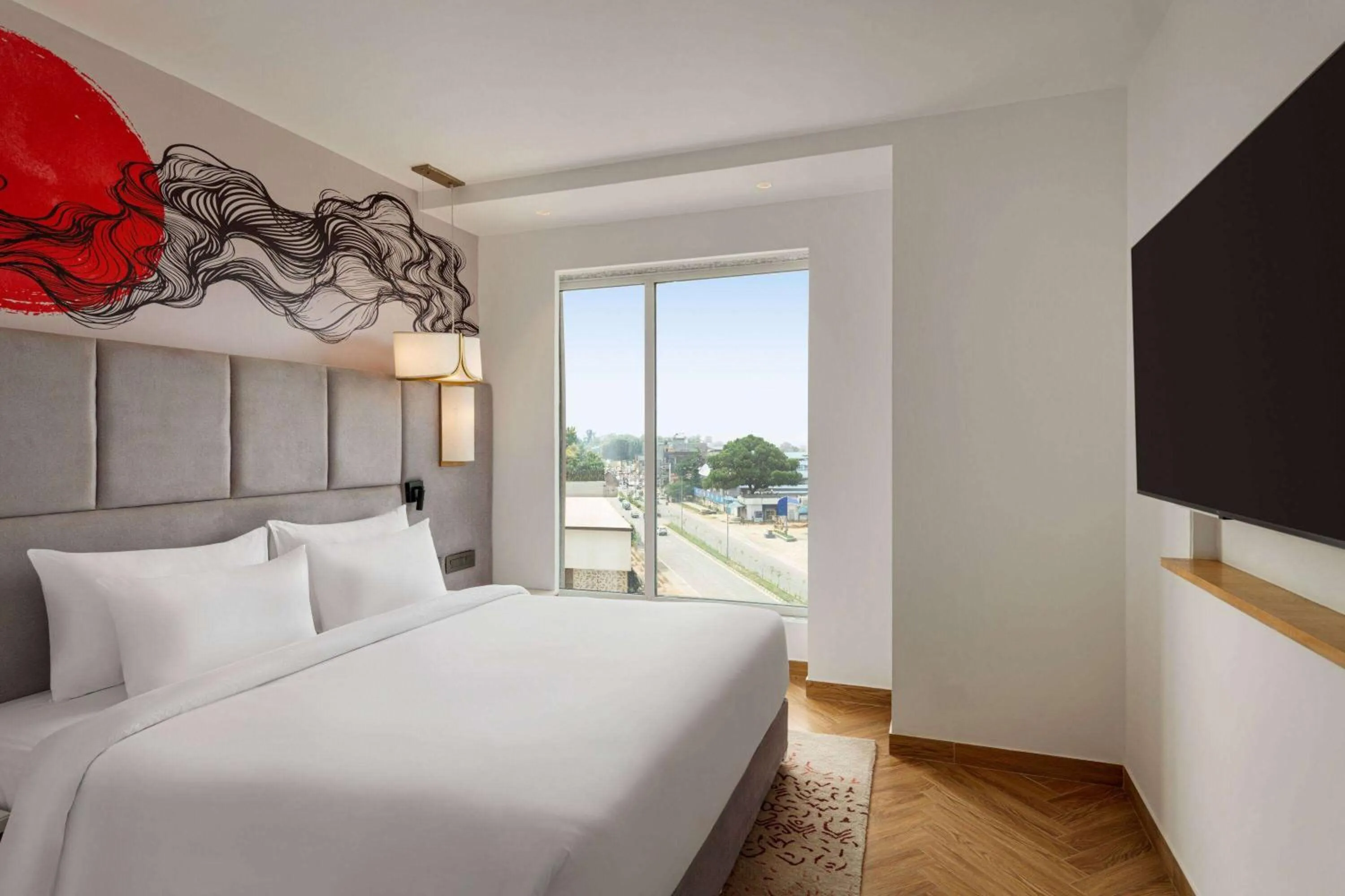 Photo of the whole room, Bed in Ramada by Wyndham Gorakhpur Gorakhnath Mandir Road