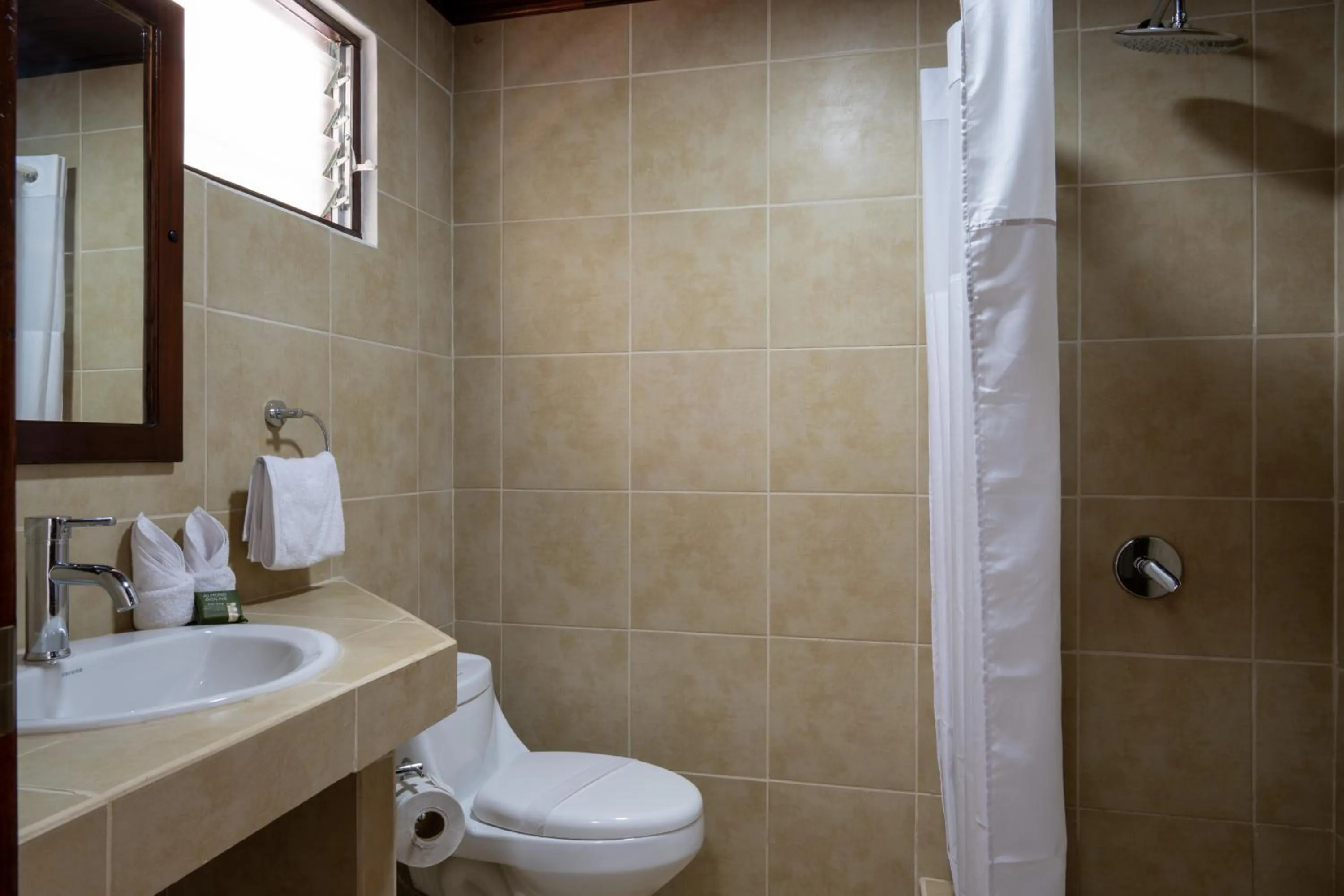 Bathroom in Fuego del Sol Beachfront Hotel