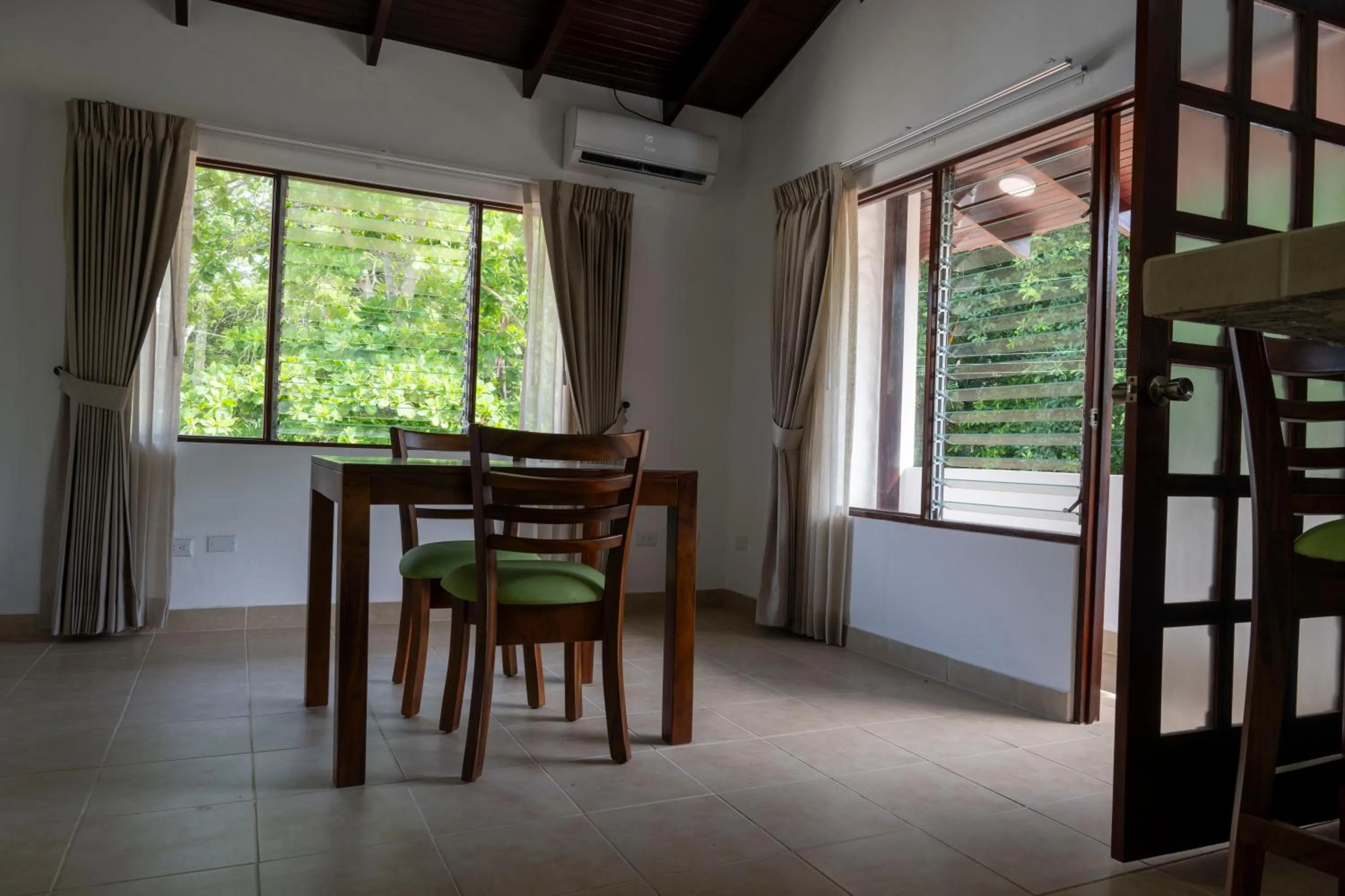 Dining area in Fuego del Sol Beachfront Hotel