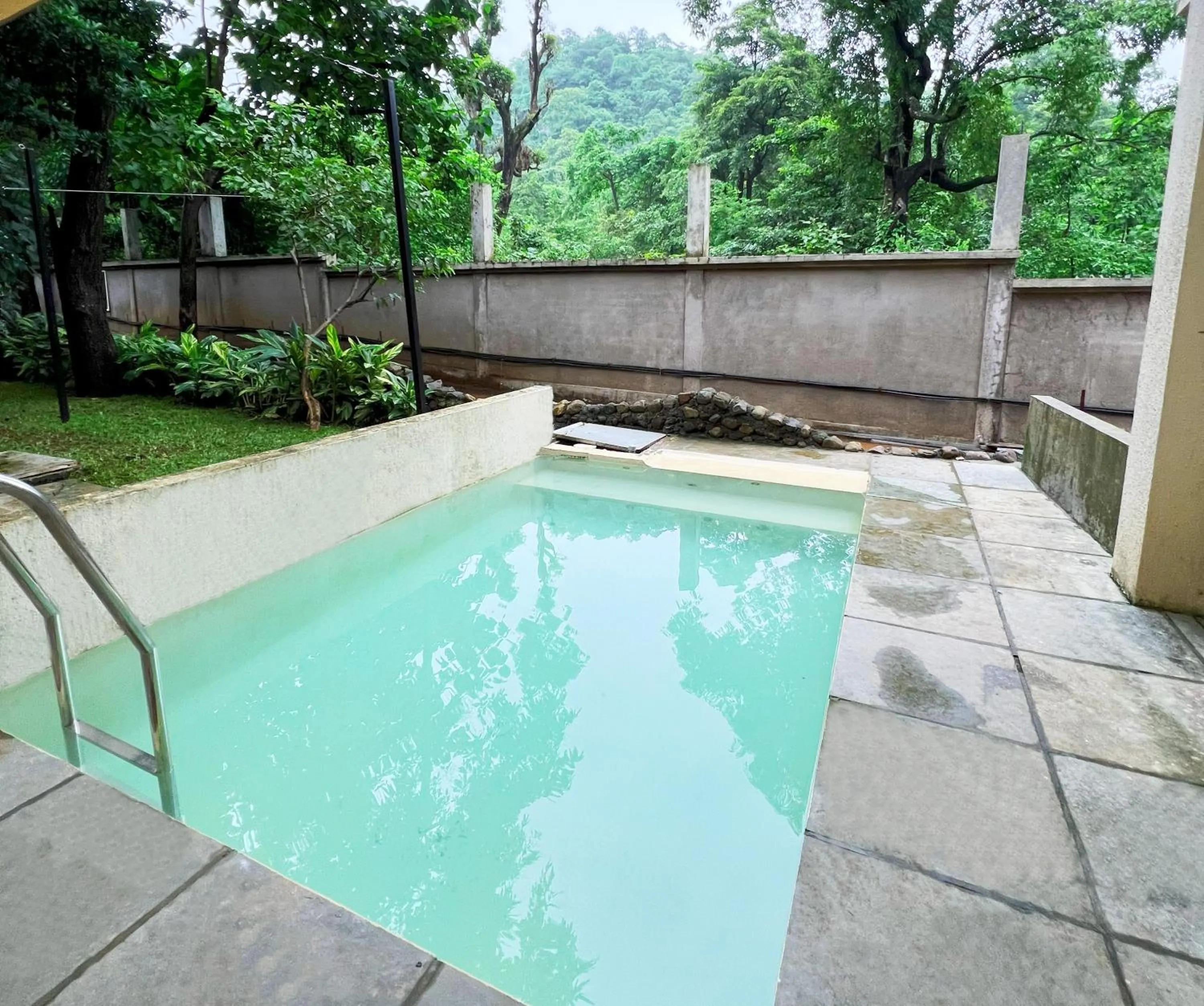 Swimming pool in Avhyay Resort