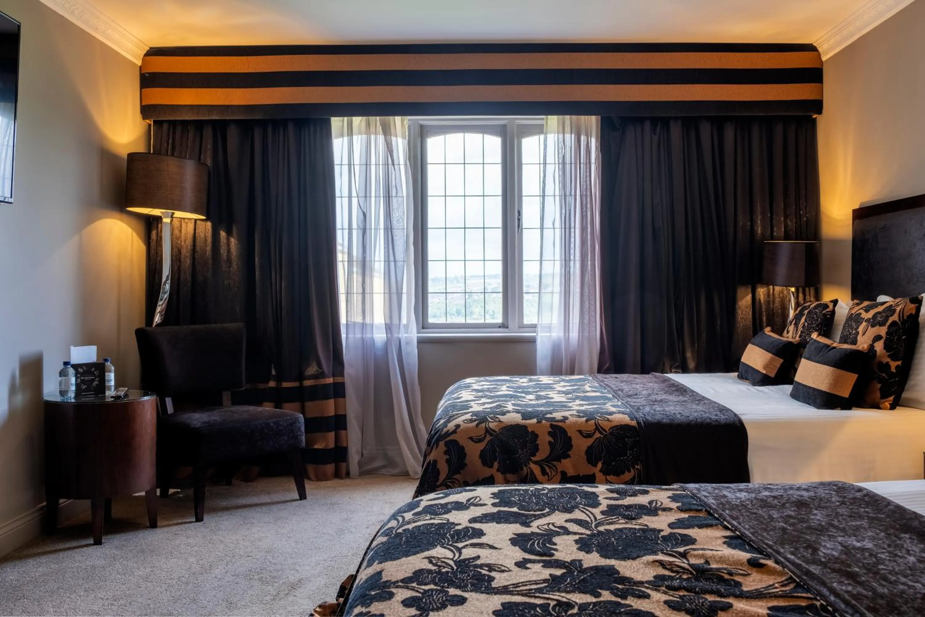 Bed in Derwent Manor Boutique Hotel