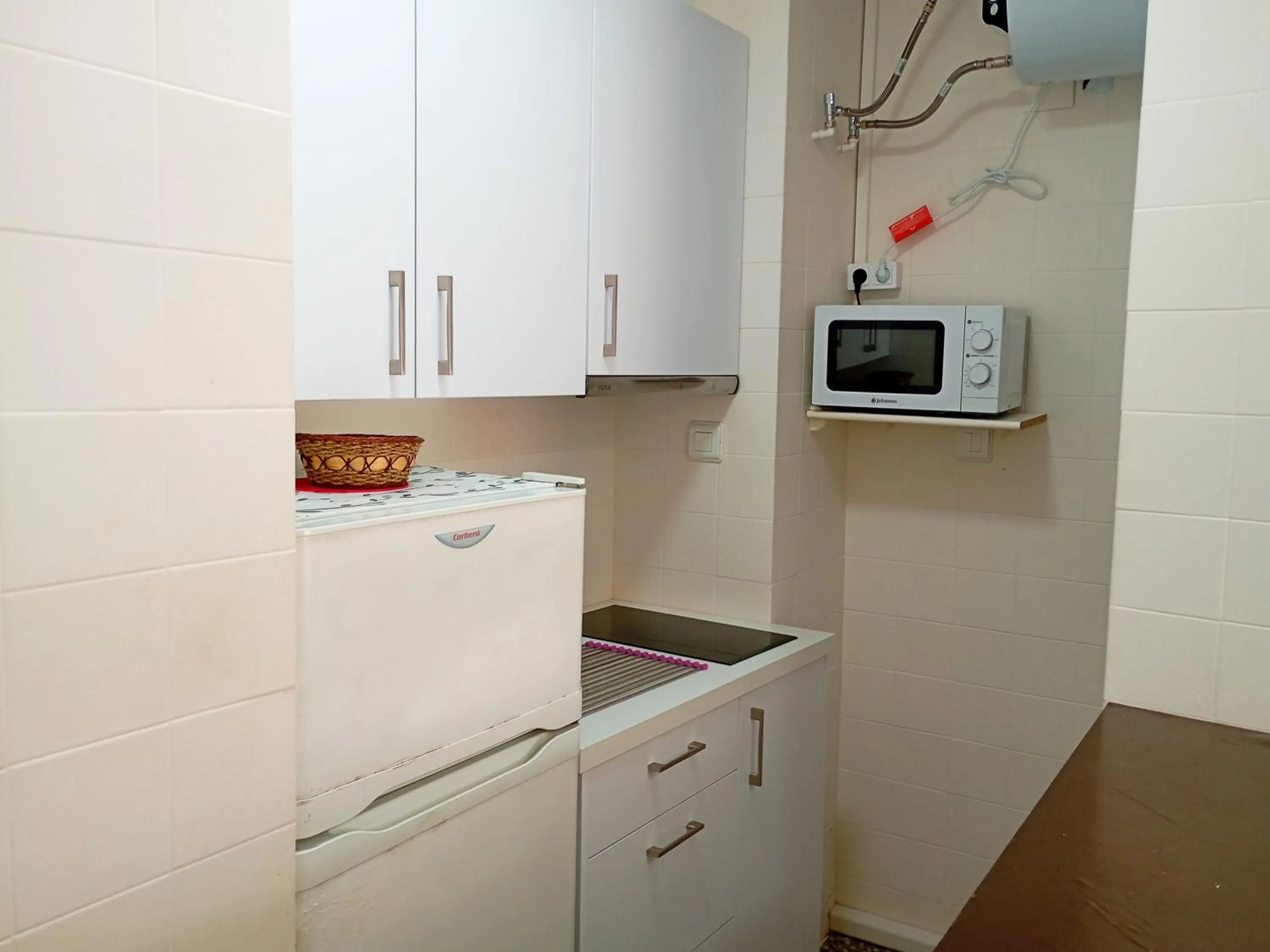 Kitchen or kitchenette in Apartamentos Voramar Peñíscola 3000