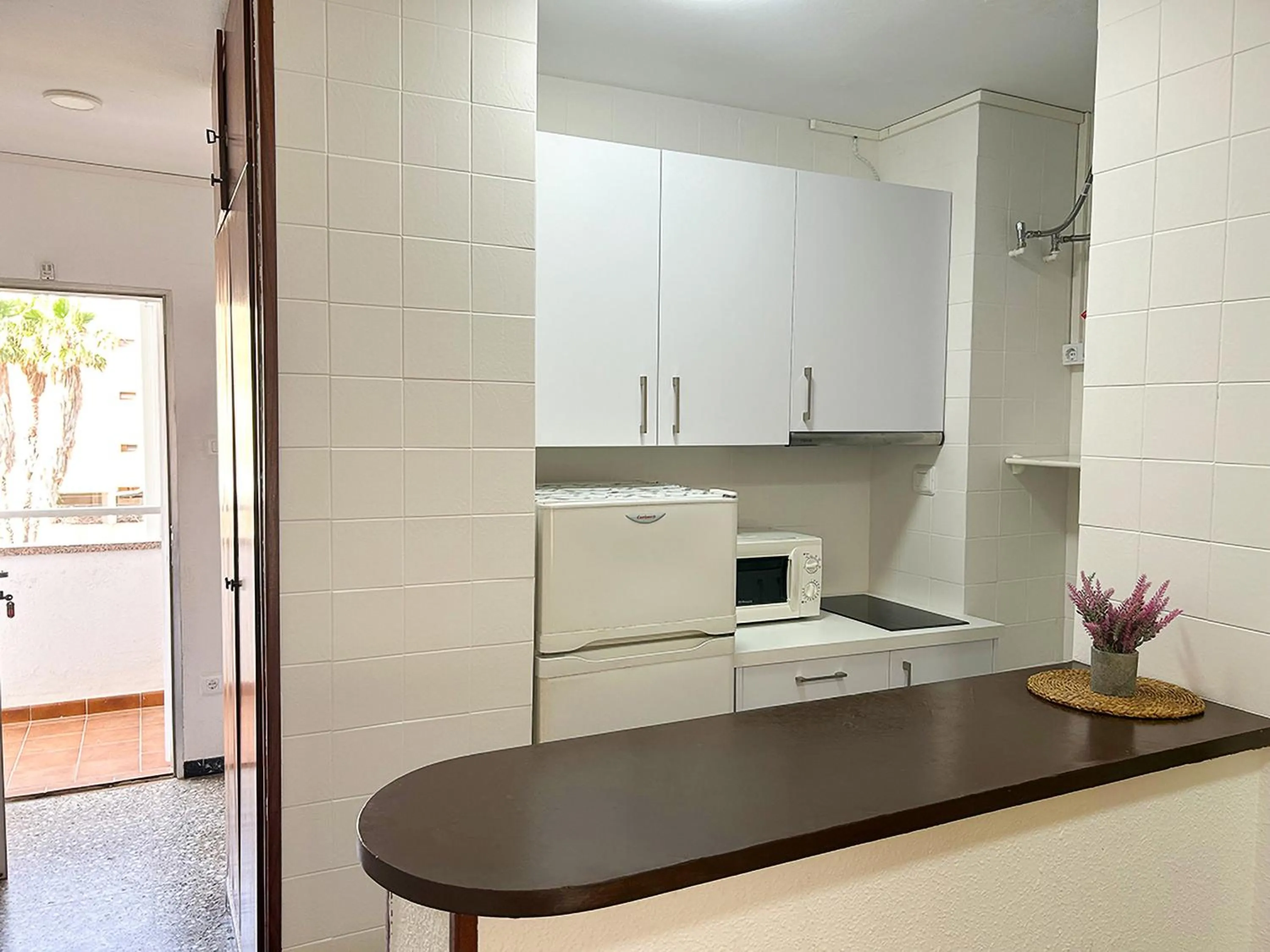 Kitchen or kitchenette in Apartamentos Voramar Peñíscola 3000