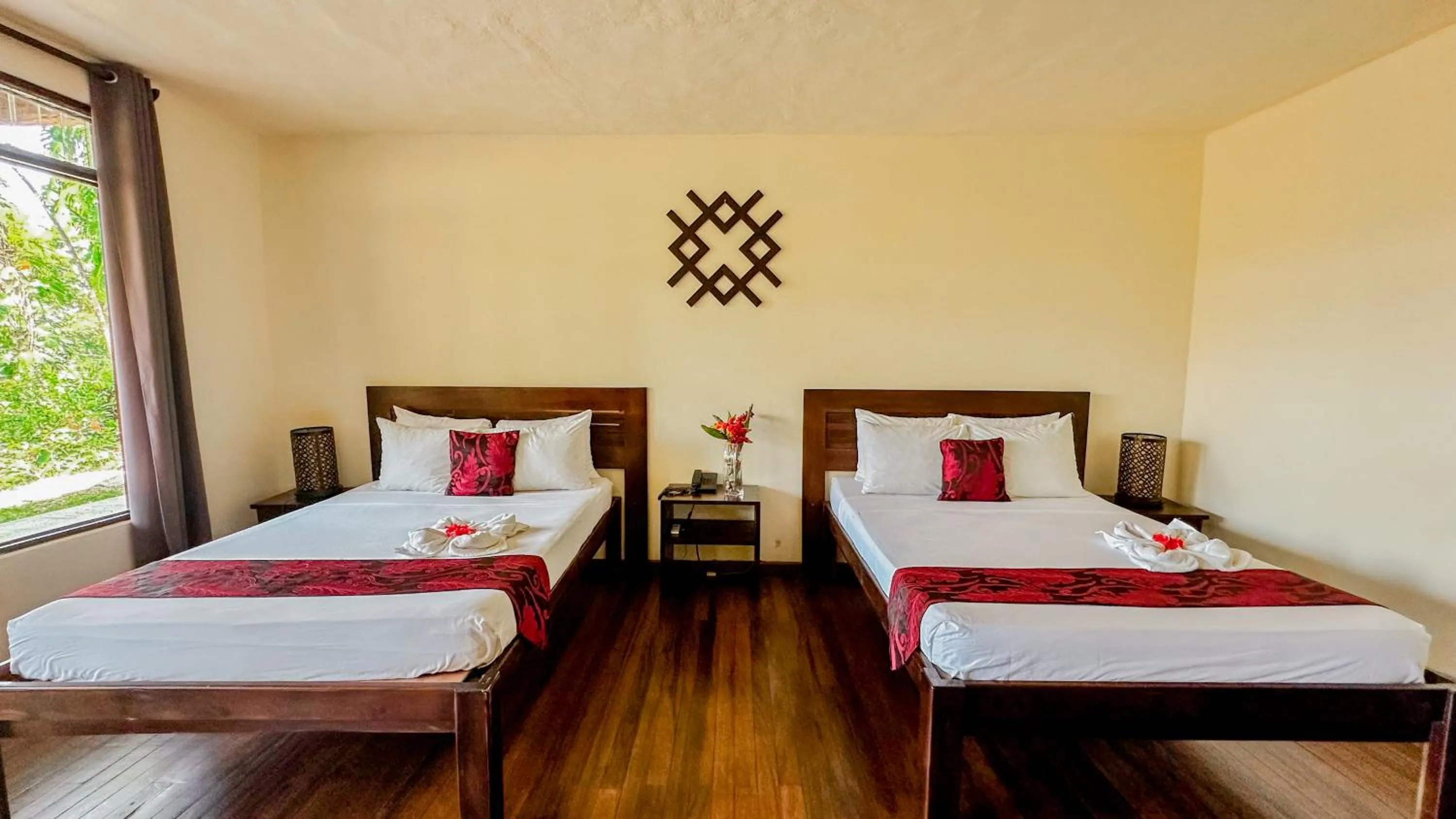 Bed in Tabulia Tree Hotel and Villas