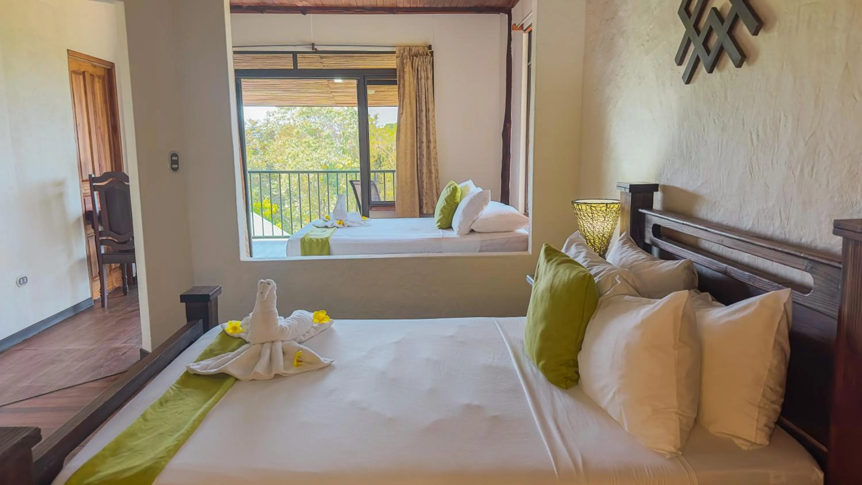 Bed in Tabulia Tree Hotel and Villas