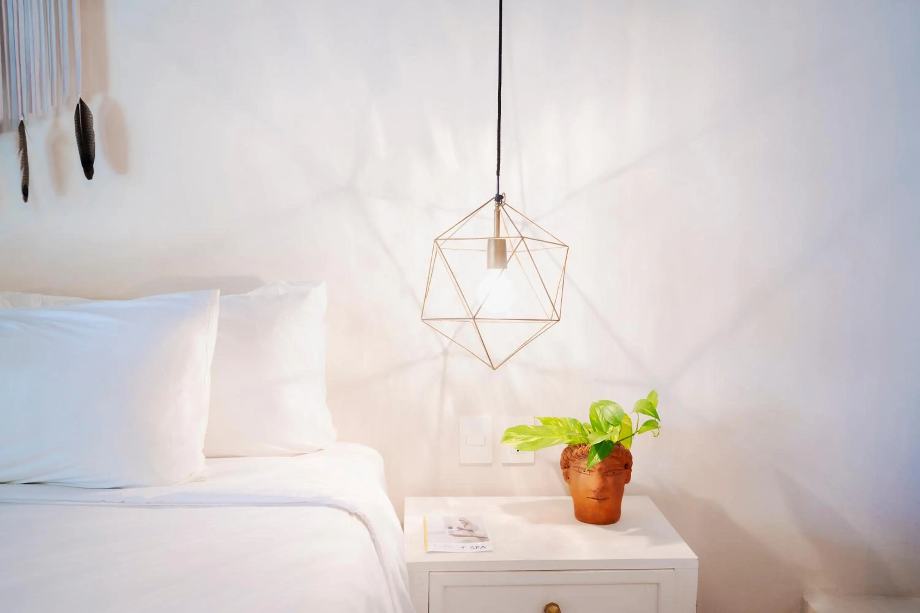 Decorative detail, Bed in Lula Tulum, a Small Luxury Hotel