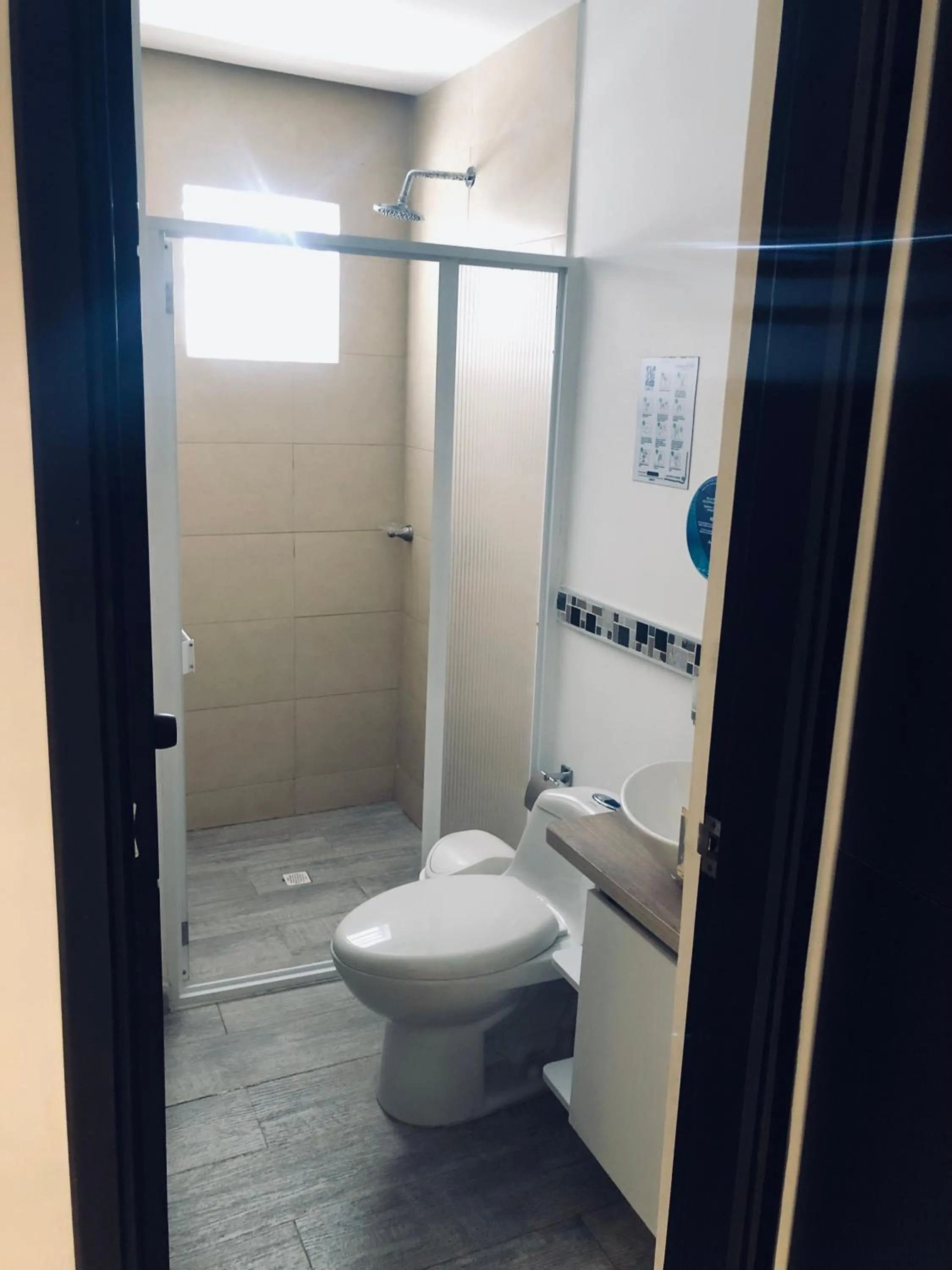 Bathroom in White Coral ApartaSuites