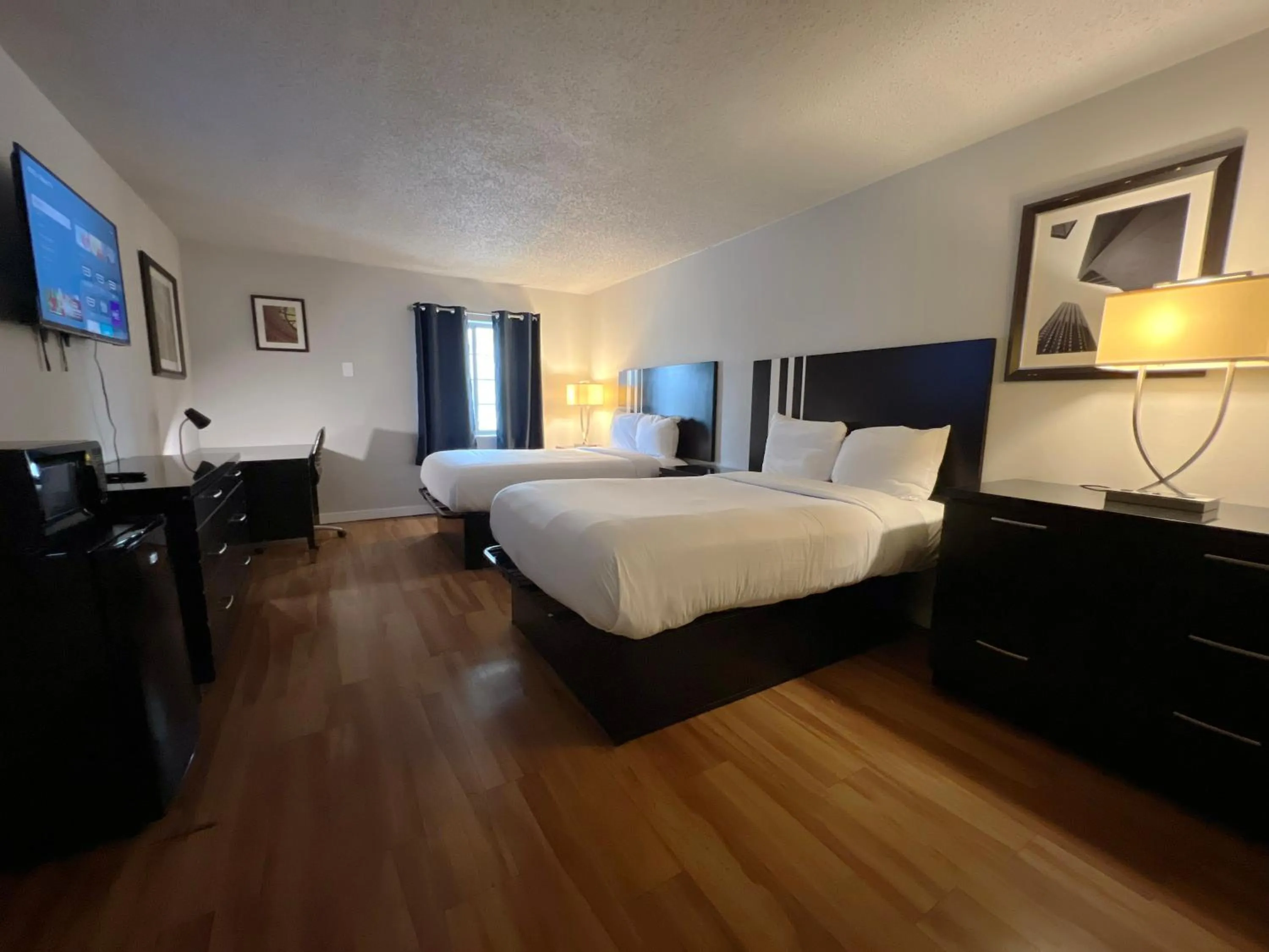 Bed in Boardwalk Suites Lafayette