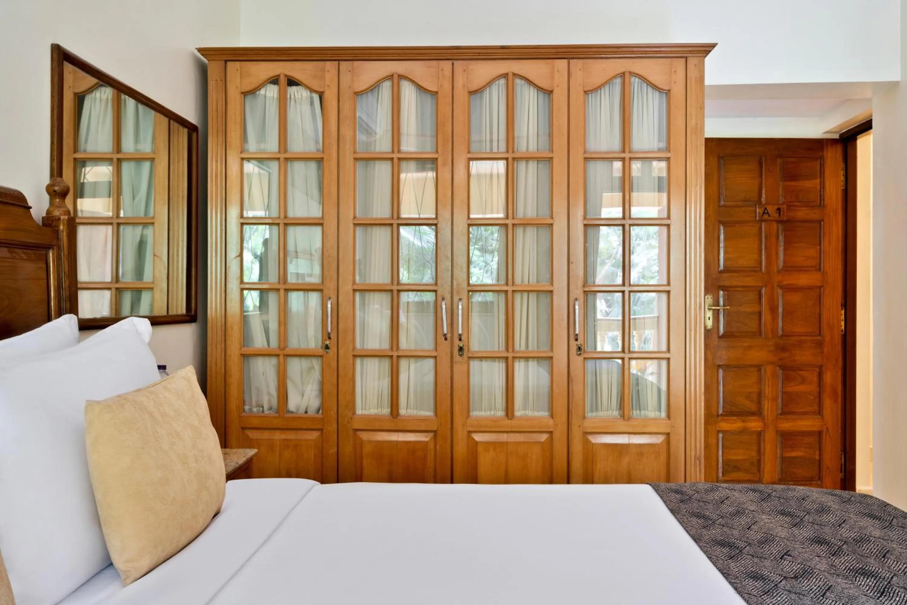 furniture, Bed in De Mandarin Beach Resort Suites & Villas, Candolim