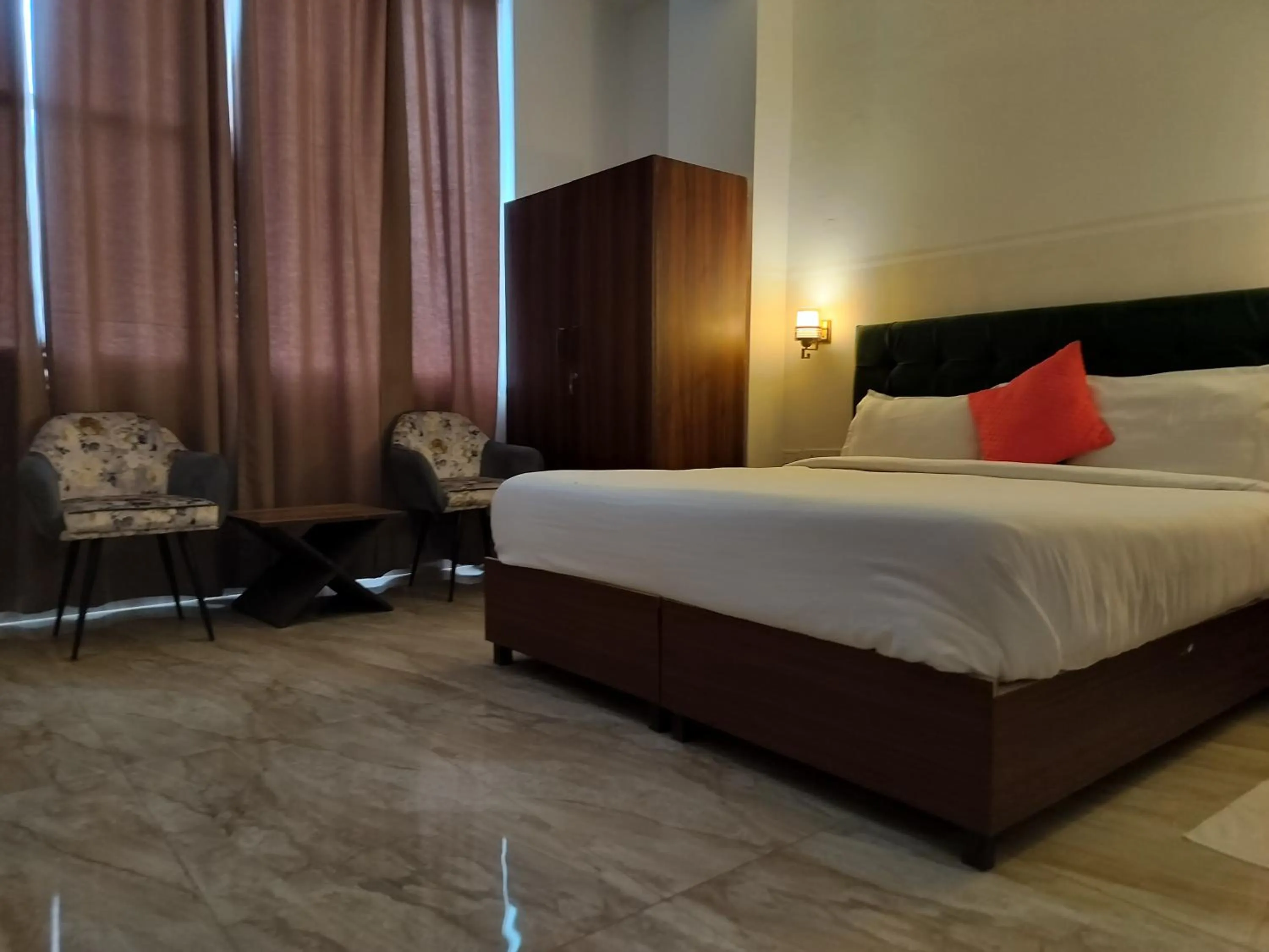 Bedroom, Bed in Saffron Inn - Expo India Mart