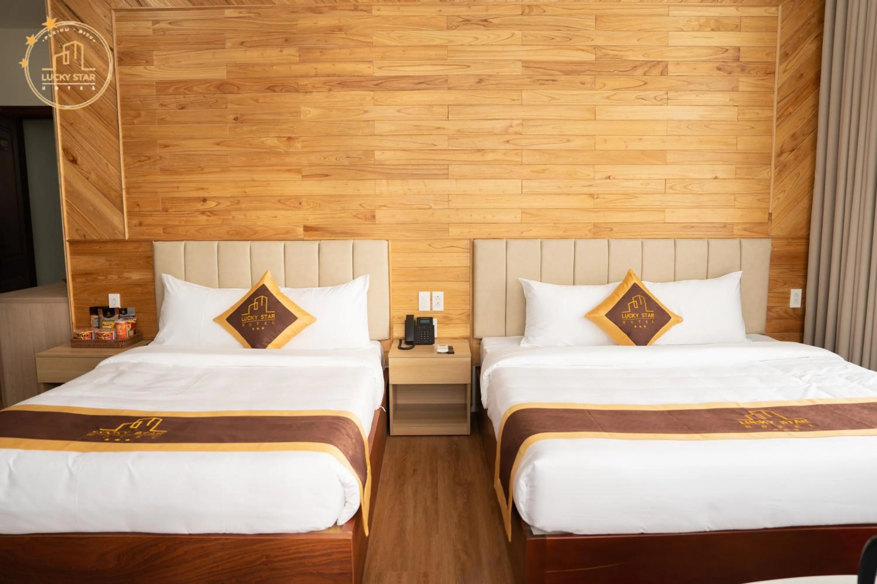 Bed in LuckyStar Hotel