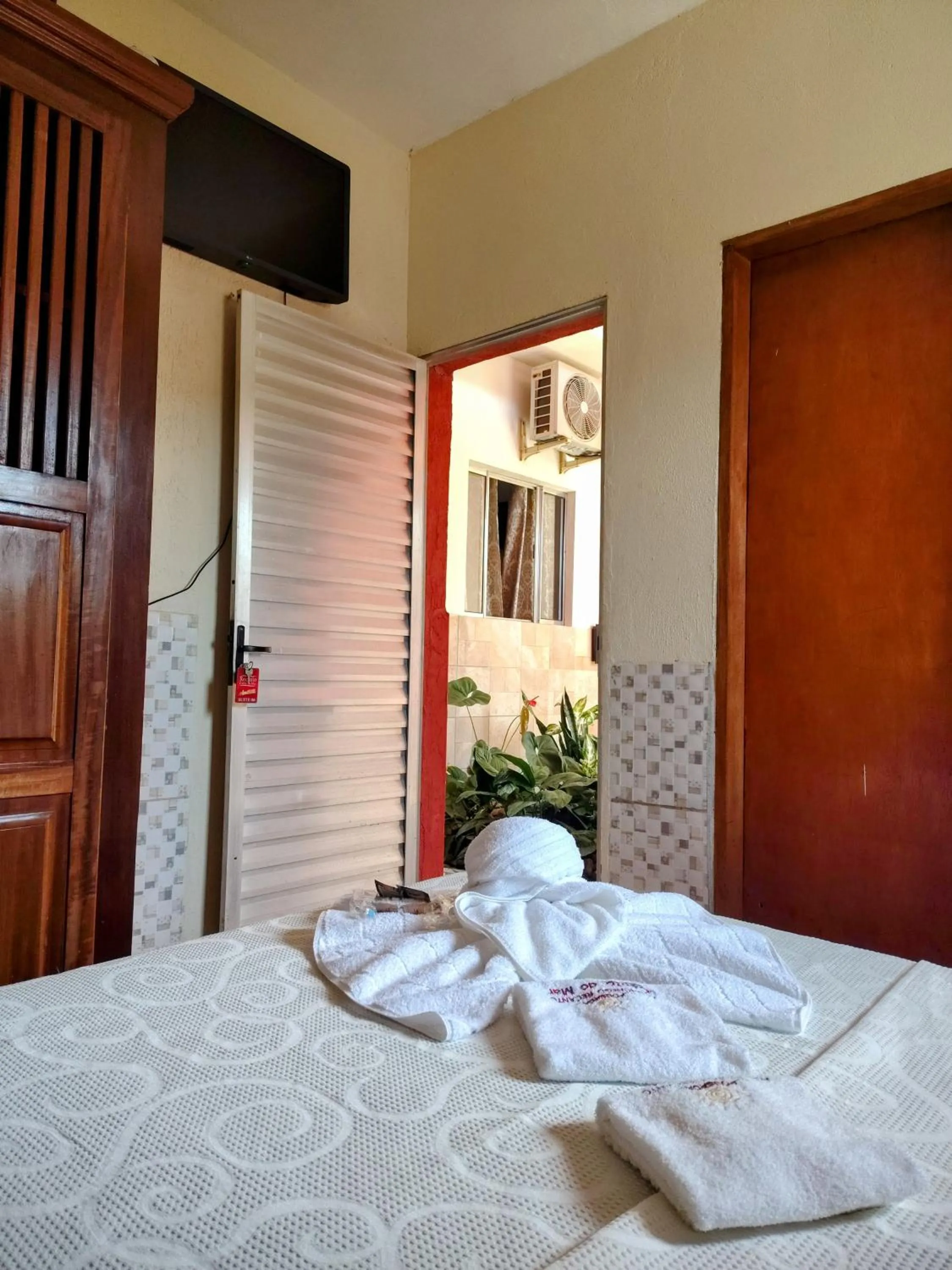 Bed in Pousada Aconchego Recanto Do Mar