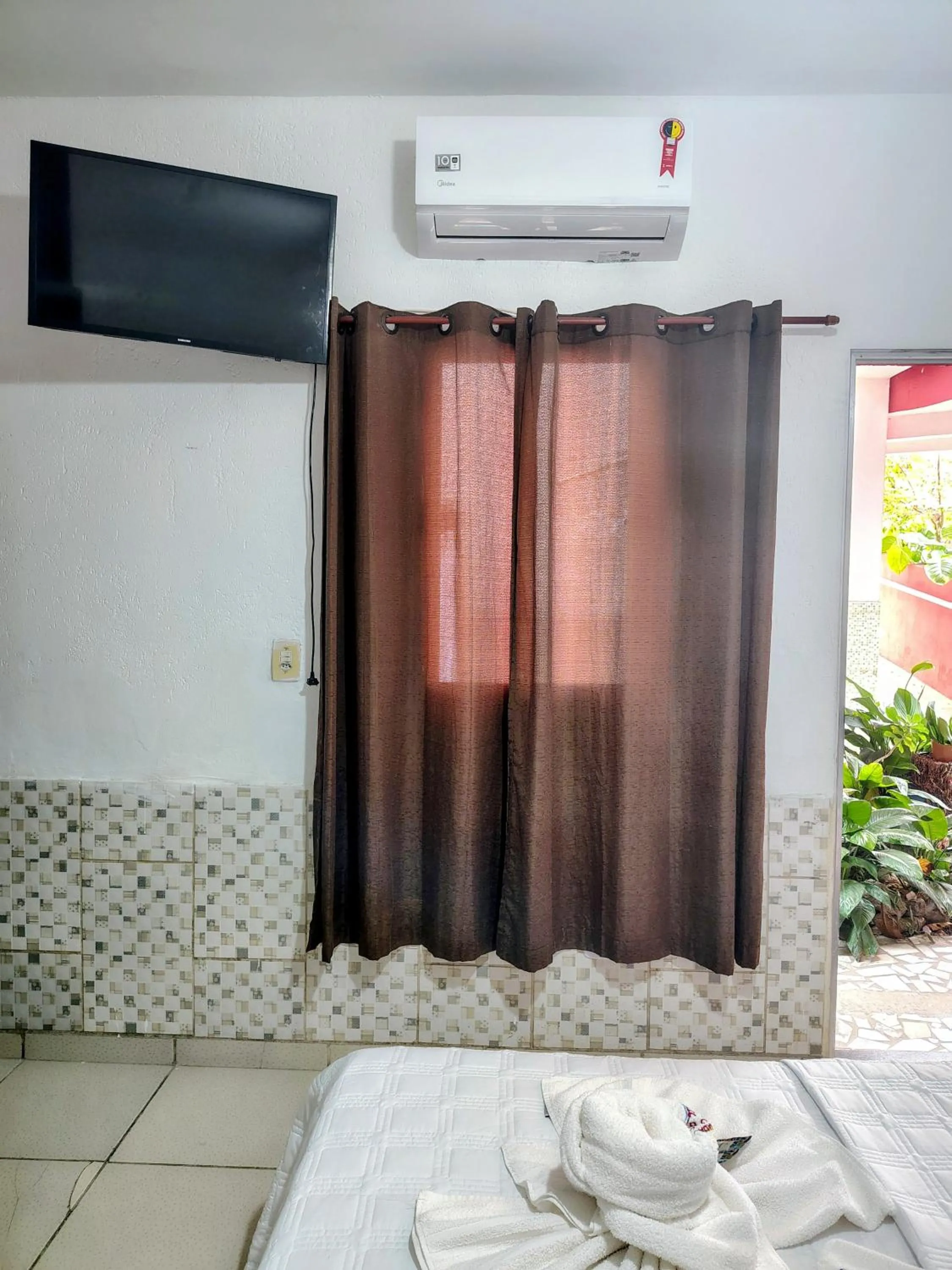 Bed in Pousada Aconchego Recanto Do Mar