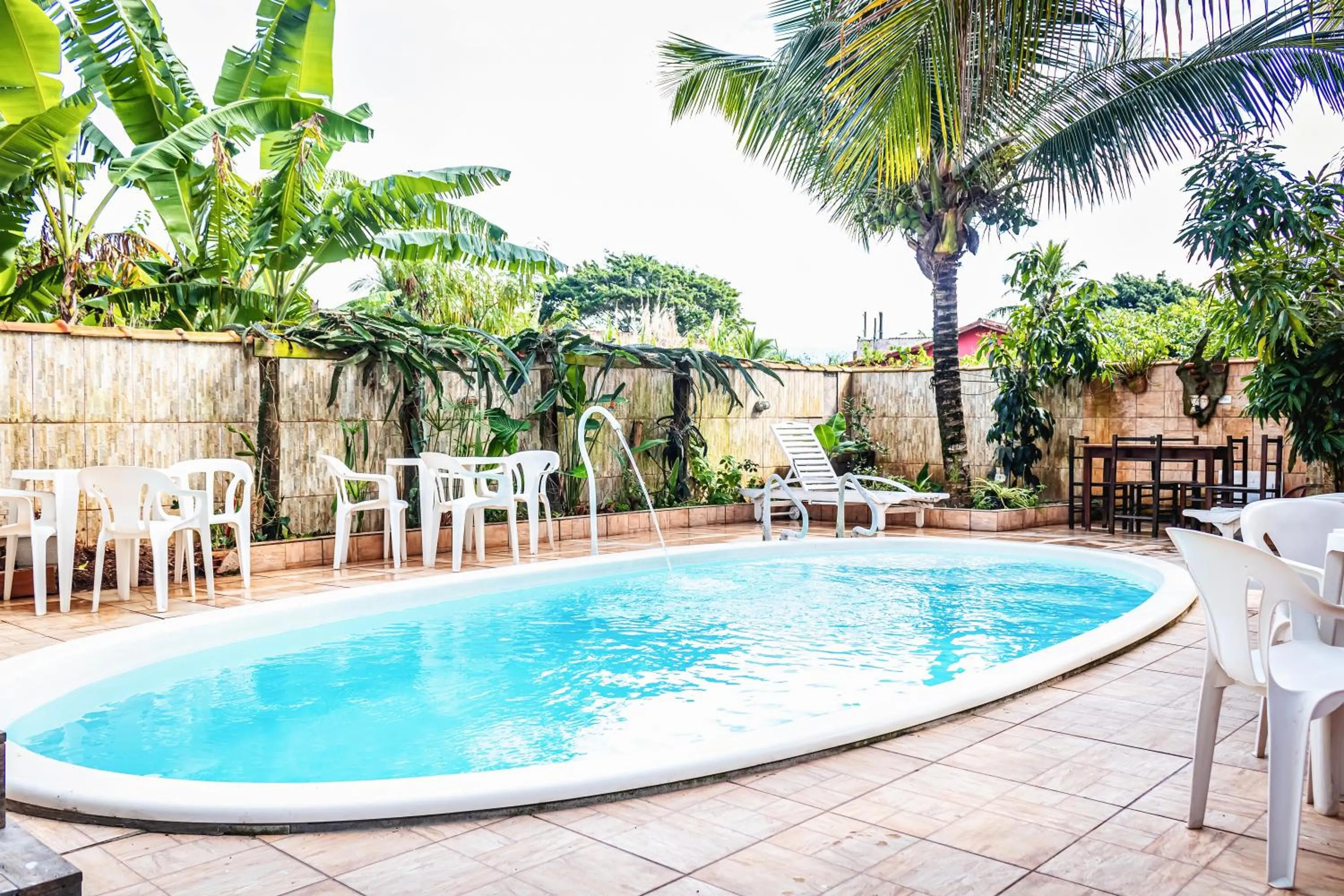 Pool view in Pousada Aconchego Recanto Do Mar