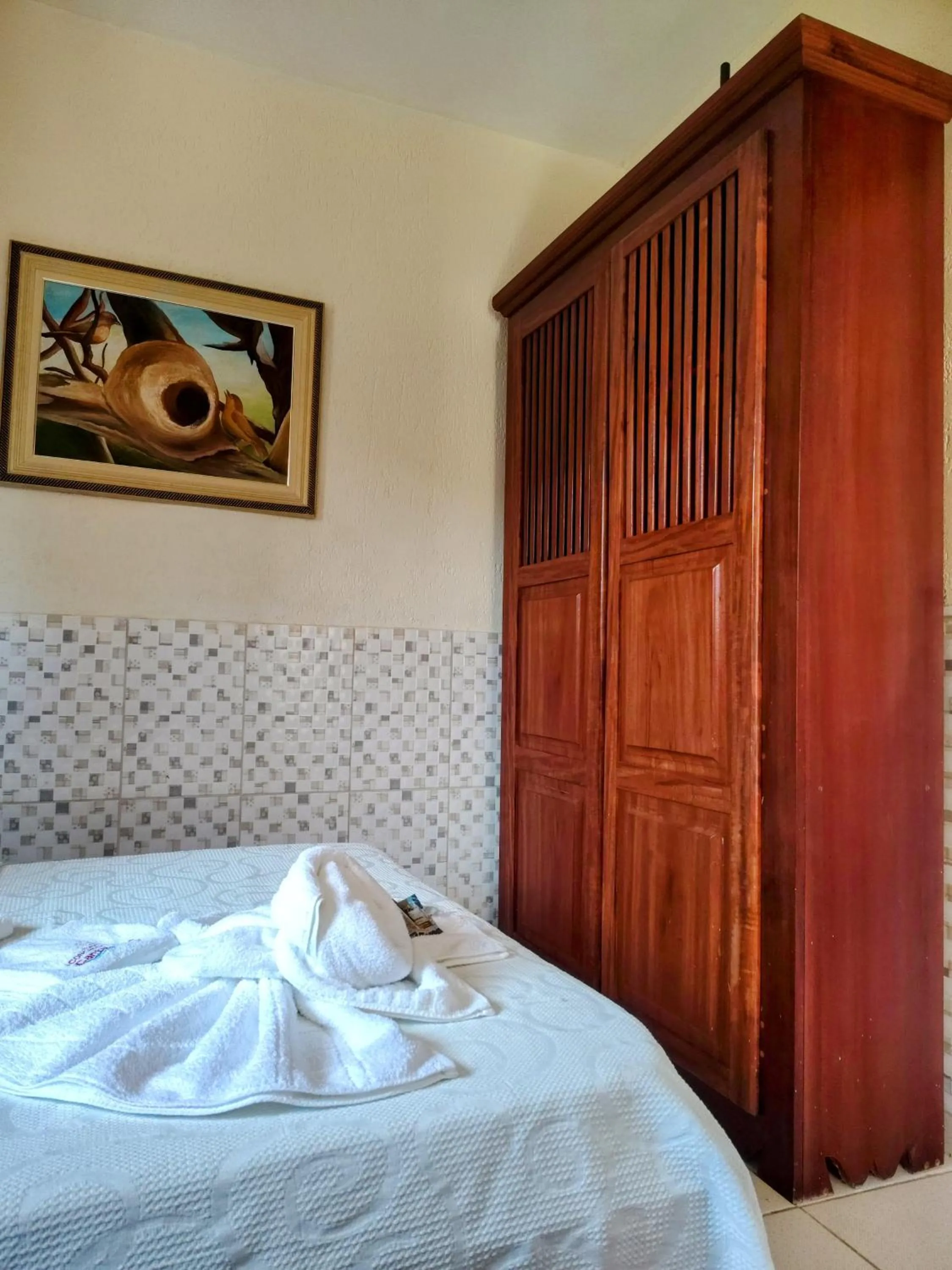 Bed in Pousada Aconchego Recanto Do Mar