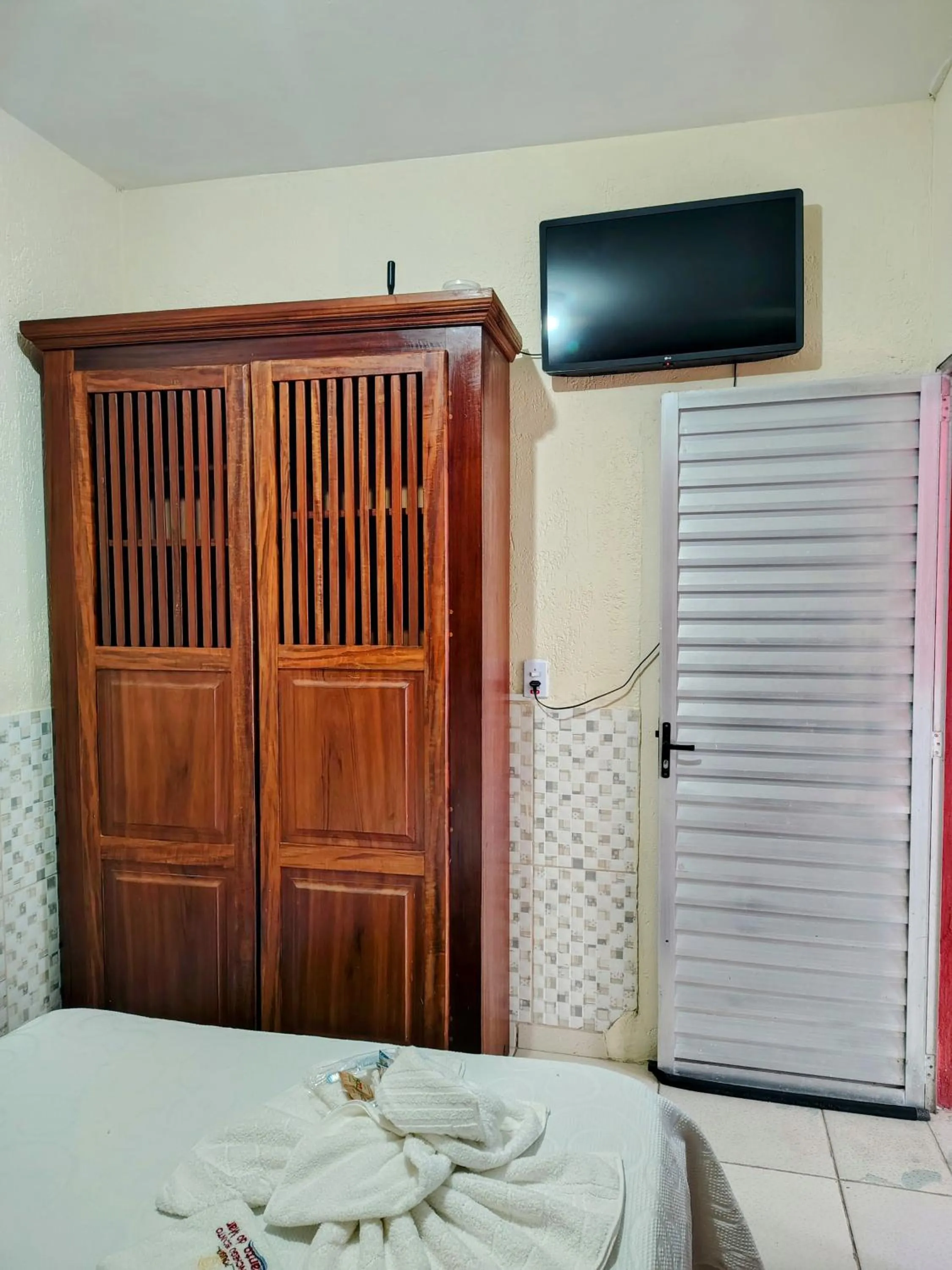 Bed in Pousada Aconchego Recanto Do Mar