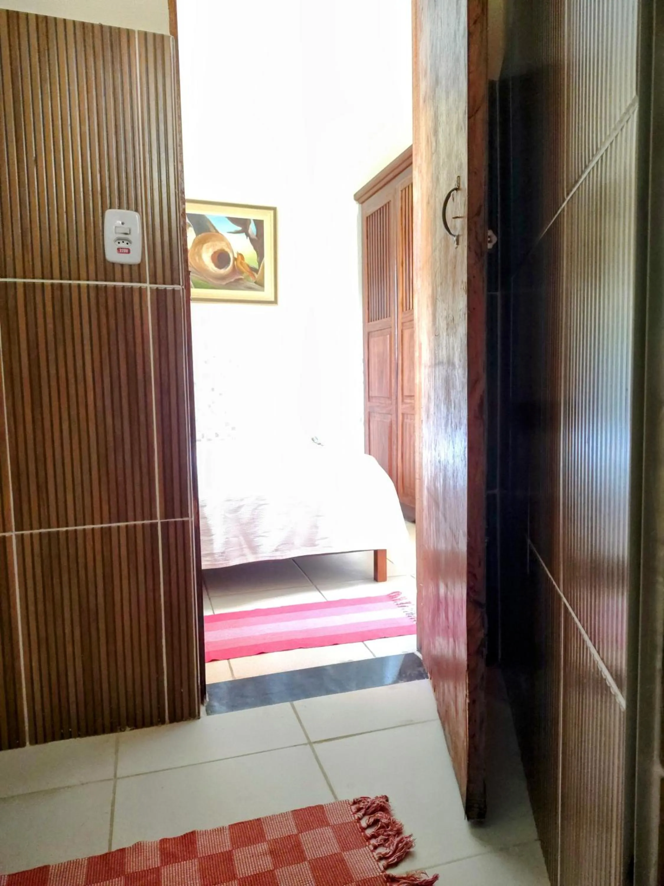 wardrobe in Pousada Aconchego Recanto Do Mar