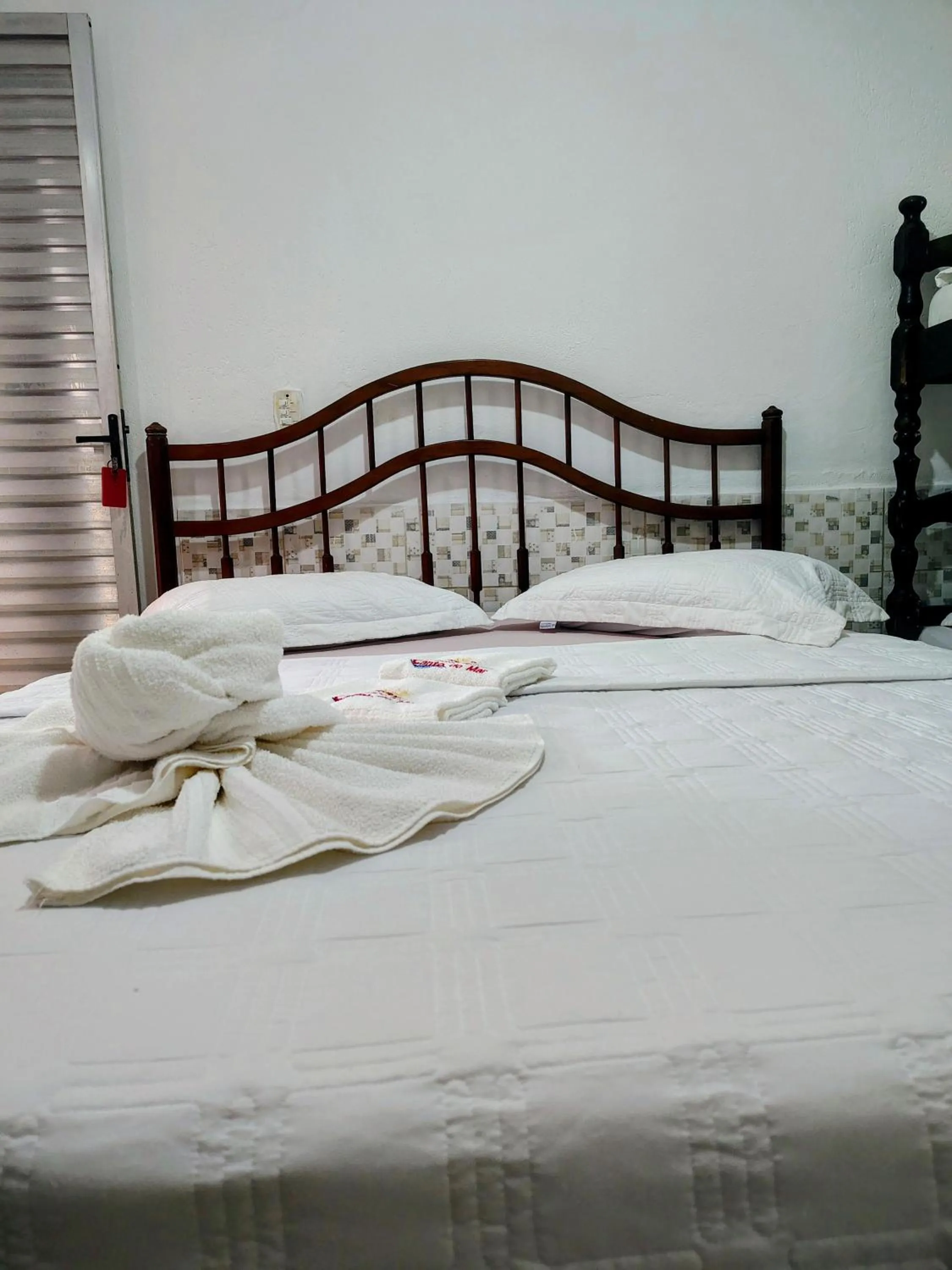 Bed in Pousada Aconchego Recanto Do Mar