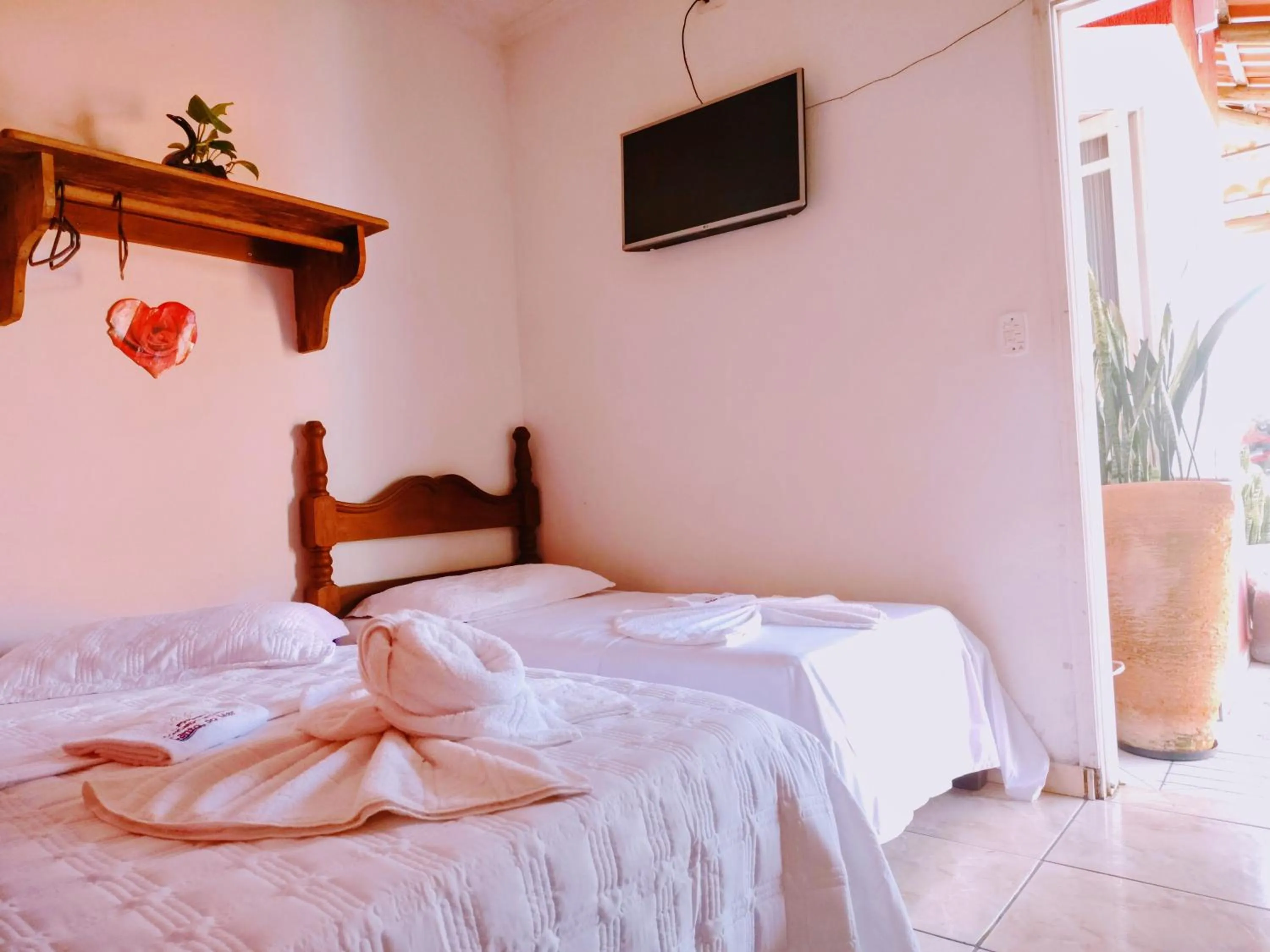 Bed in Pousada Aconchego Recanto Do Mar