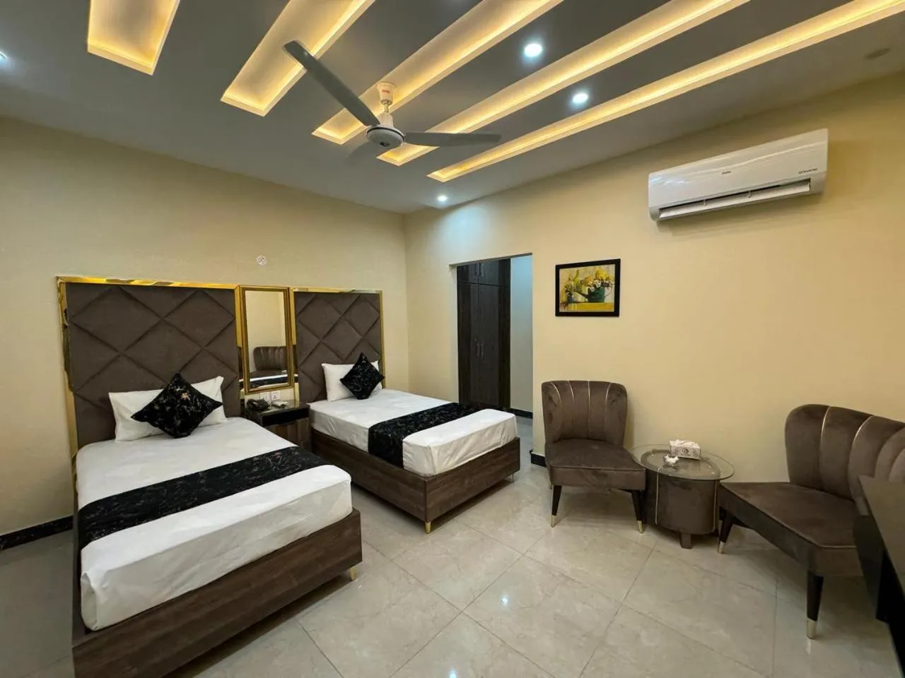 Bed in Gold Pine Hotel Lahore